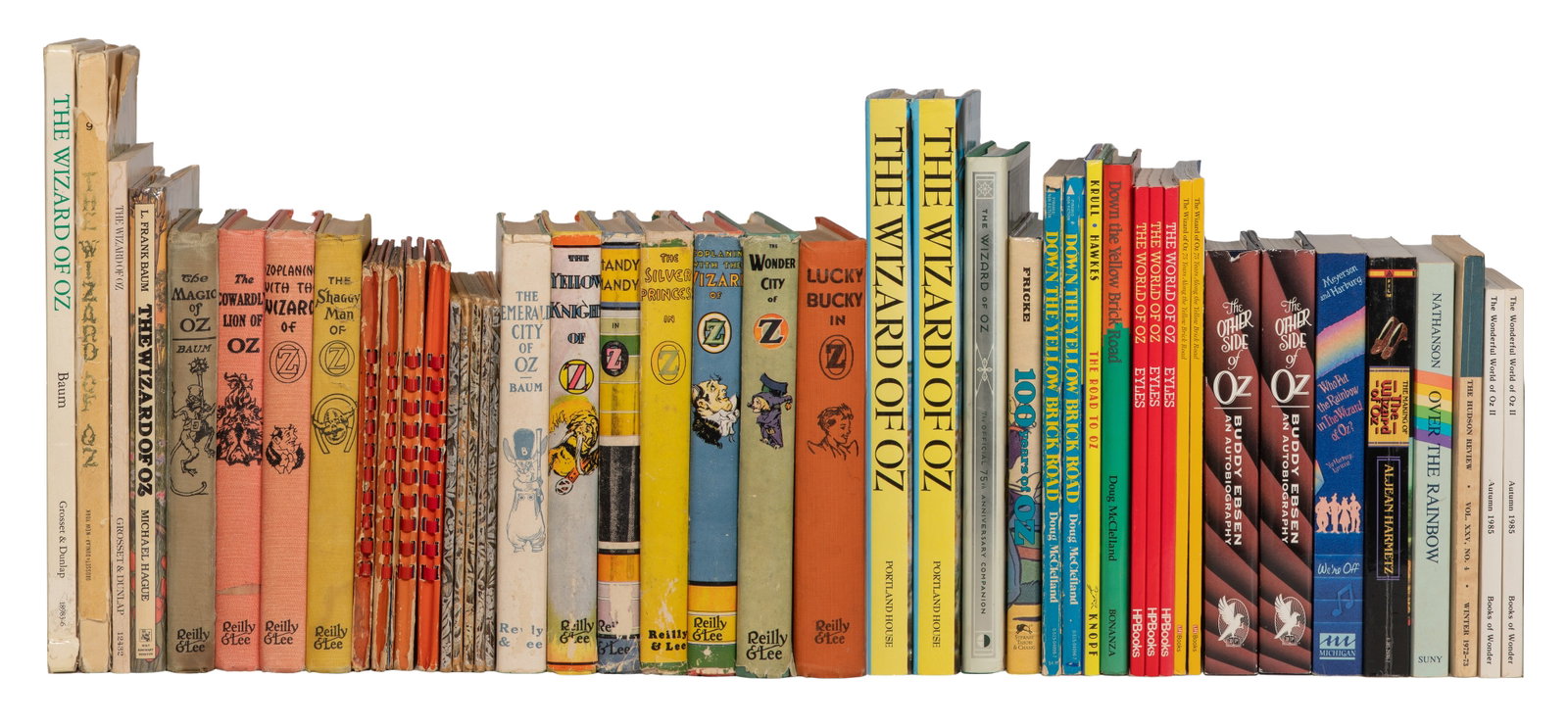 Oz Book Assortment: Oz Book Assortment Approximately (50) books by various authors such as L. Frank Baum and Ruth Plumly Thompson, including later reprints and modern reference Property from: a Private Collector, Kansas