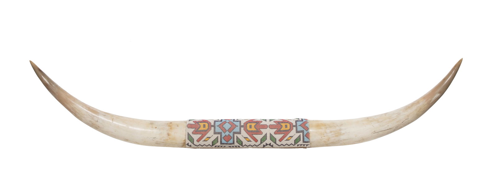Native American Style Beadwork Decorated Steer Horns: Native American Style Beadwork Decorated Steer Horns Having a loom woven beadwork panel attached to the leather wrap Property from: a Private Collector, Lemont, Illinois Height: 10 inches, Width: 58