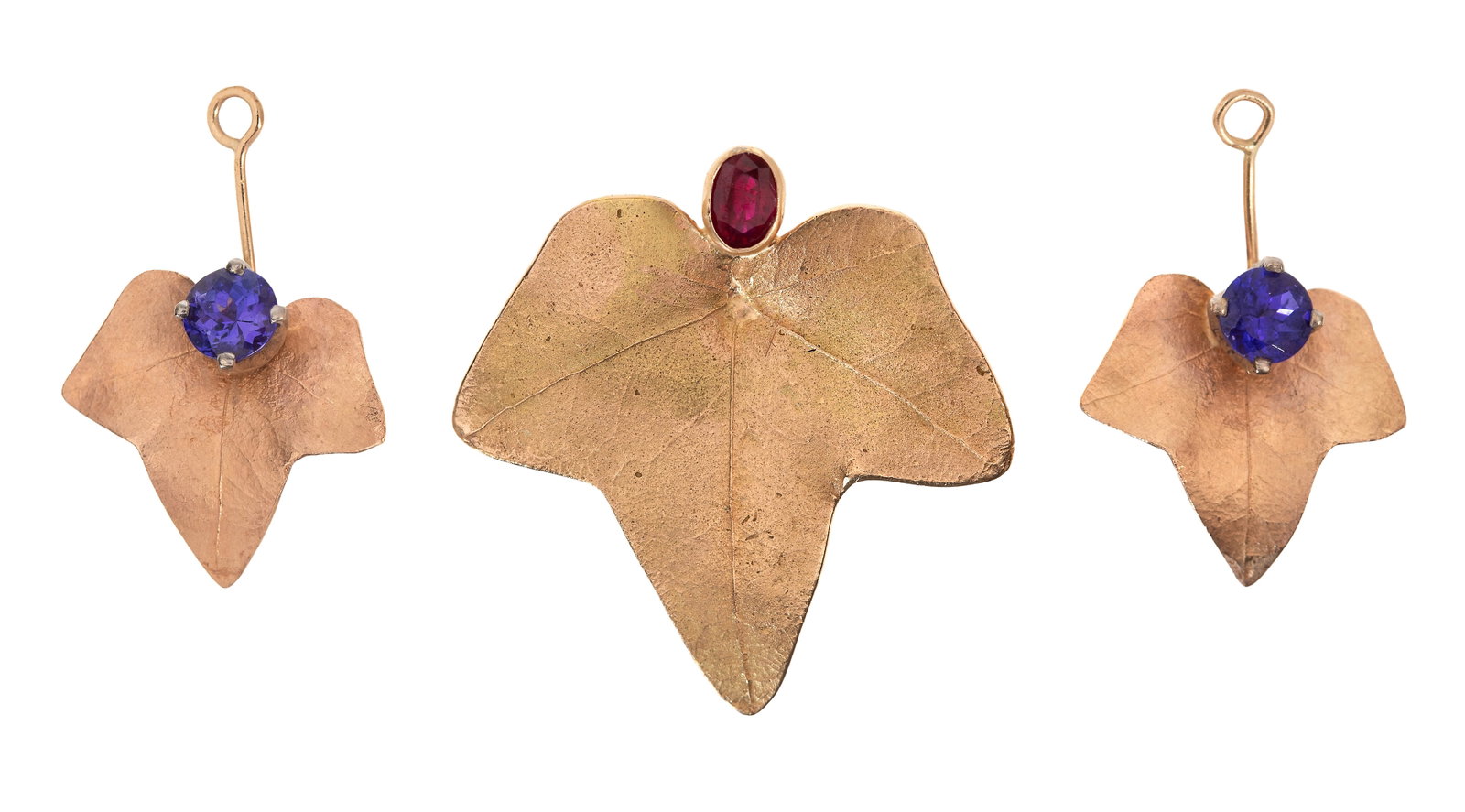 14k Yellow Gold and Gemstone Jewelry: 14k Yellow Gold and Gemstone Jewelry (2) leaf-form items including a brooch having an oval cut ruby and a pair of earring jackets having round cut iolites (marked '14k') Property from: an Estate,