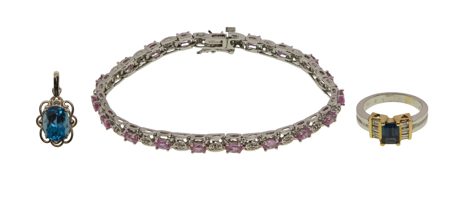 14k White Gold and Gemstone Jewelry Assortment: 14k White Gold and Gemstone Jewelry Assortment (3) items including a ring having an emerald cut sapphire flanked by baguette cut diamonds, the gemstones set in yellow gold, and a bracelet having oval 