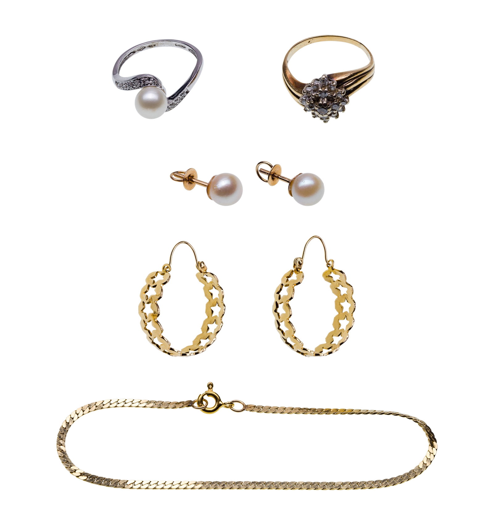 14k and 10k Gold Jewelry Assortment: 14k and 10k Gold Jewelry Assortment (5) items including a diamond cluster ring, a pair of hoop style pierced earrings, a chain style bracelet (most marked '14k') as well as an approximately 7mm pearl 