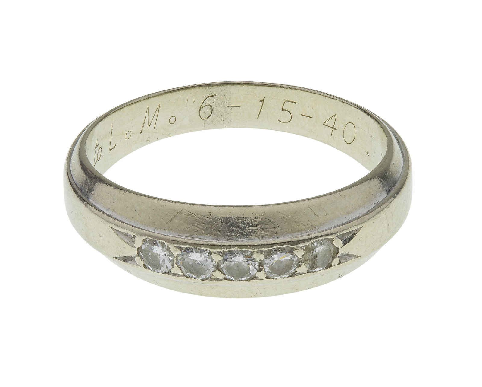 14k White Gold and Diamond Ring: 14k White Gold and Diamond Ring Having five round cut diamonds in a channel setting (marked '14k') Property from: a Private Collector, Winnetka, Illinois Weight: 14k gold: 3.82 dwts. (total) Condition