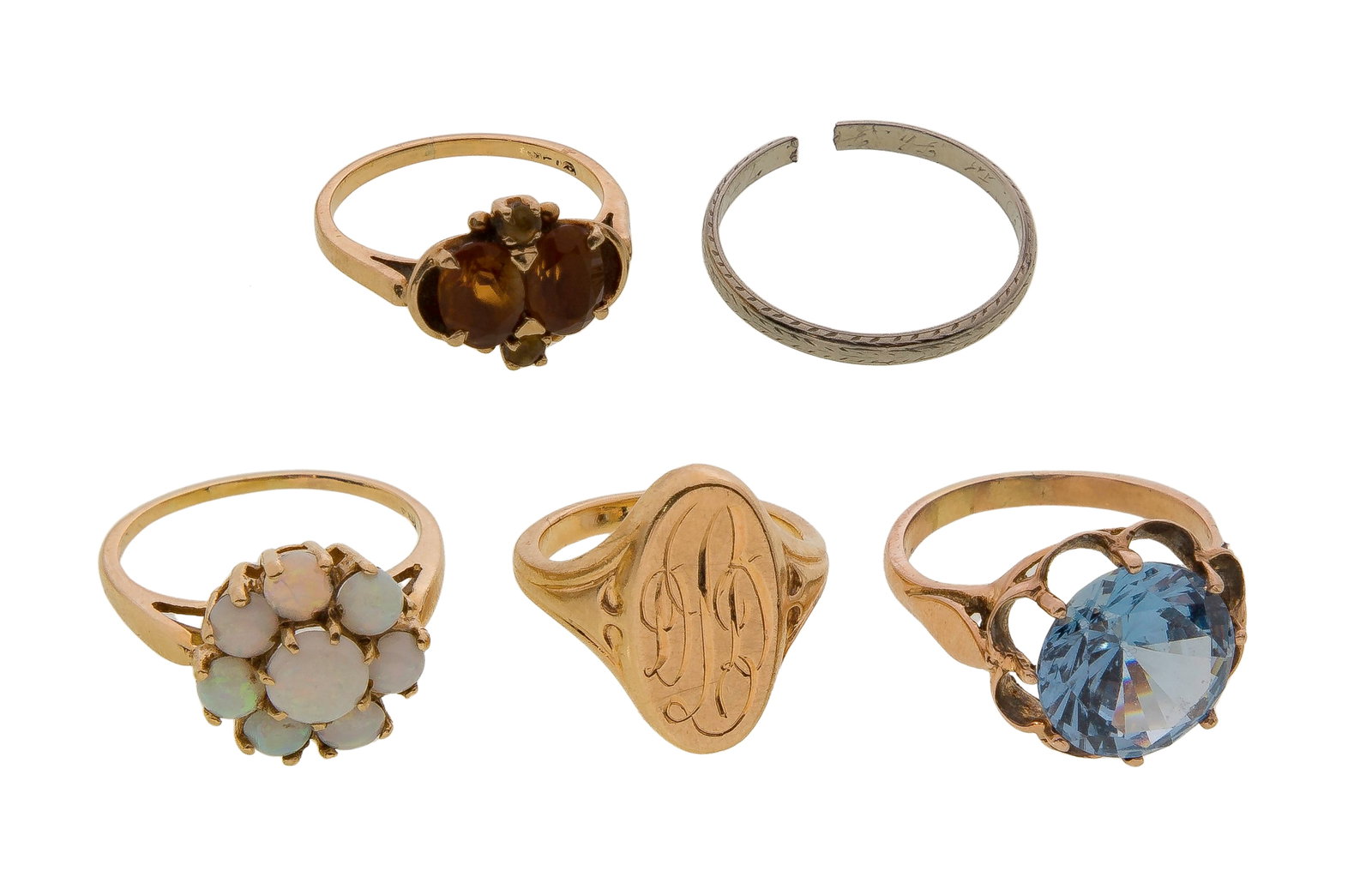 18k and 10k Gold Ring Assortment: 18k and 10k Gold Ring Assortment (5) items including a thin band ring (marked '18k'), (4) rings having opal, blue topaz, citrine and a signet (most marked '10k') Property from: an Estate, Arlington He
