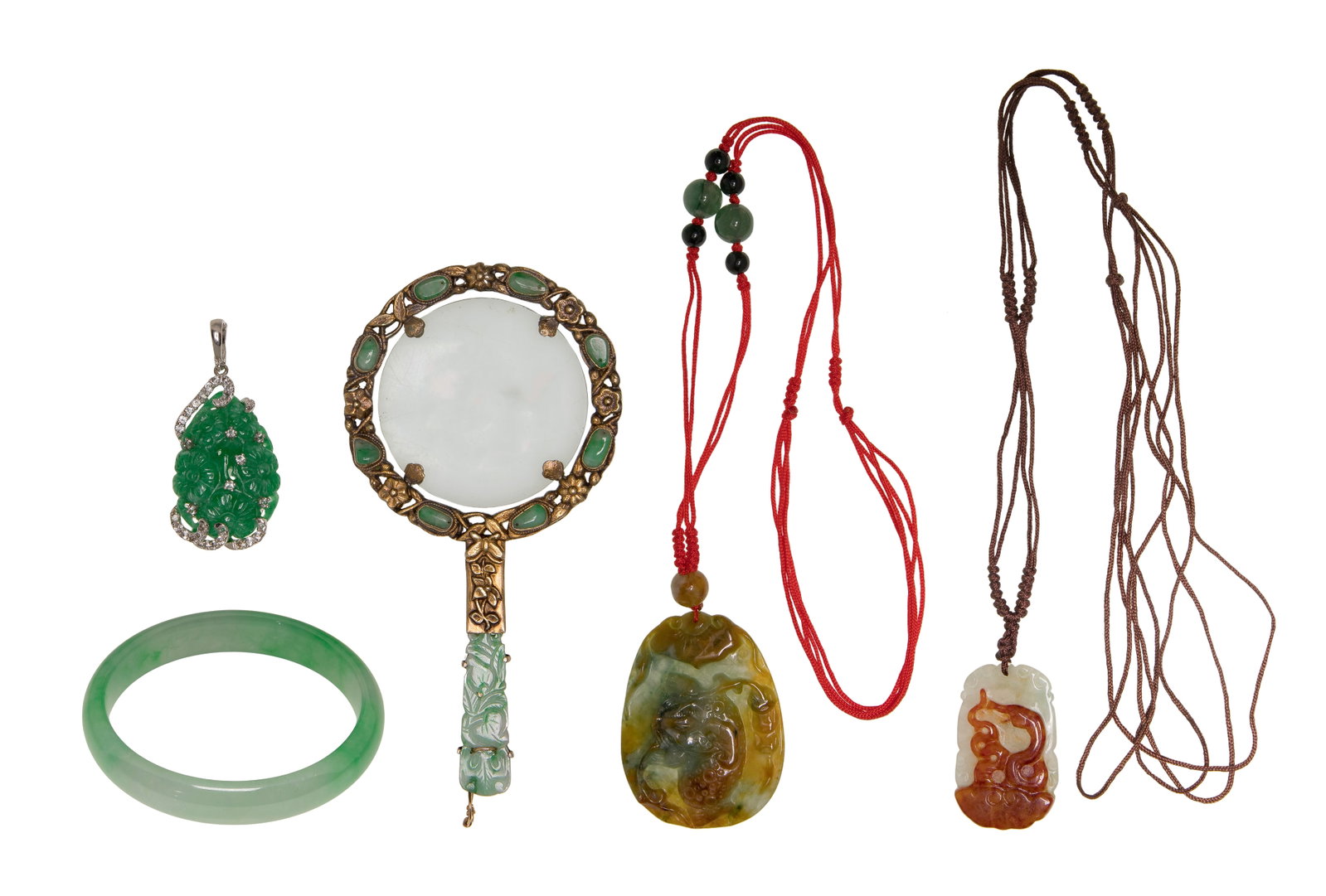 Silver and Nephrite / Jadeite Jade Jewelry Assortment: Silver and Nephrite / Jadeite Jade Jewelry Assortment (5) items including a jadeite jade and diamond pendant (marked '925'), a jadeite jade magnifying glass form pendant (unmarked silver), a jadeite j