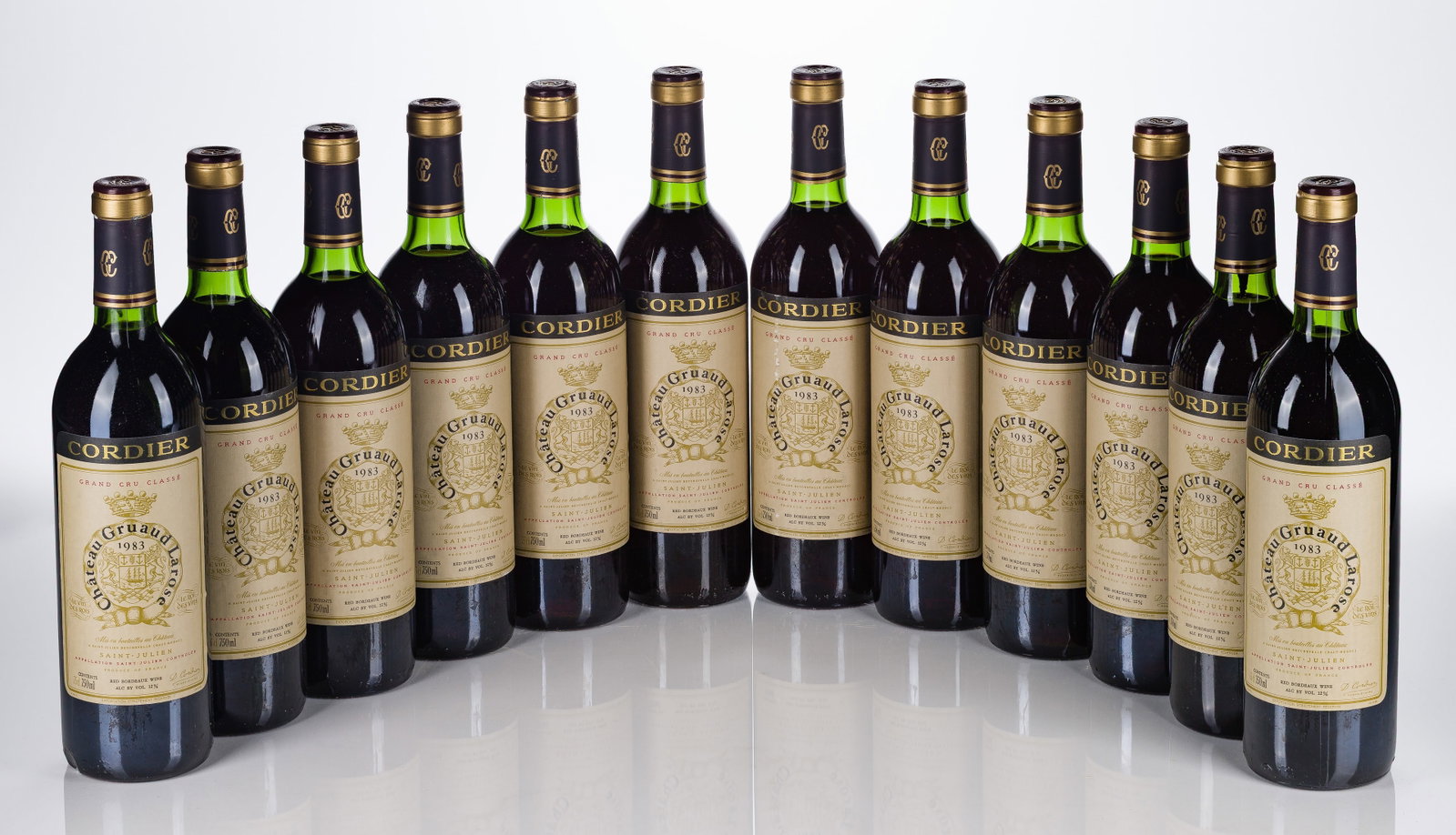 1983 Chateau Gruaud-Larose Grand Vin: 1983 Chateau Gruaud-Larose Grand Vin 1983 Chateau Gruaud-Larose Grand Vin (12x 750ml), Bordeaux, France, fill: BN, labels: fully legible, intact having minor wear, capsules / corks: (11) slightly depr