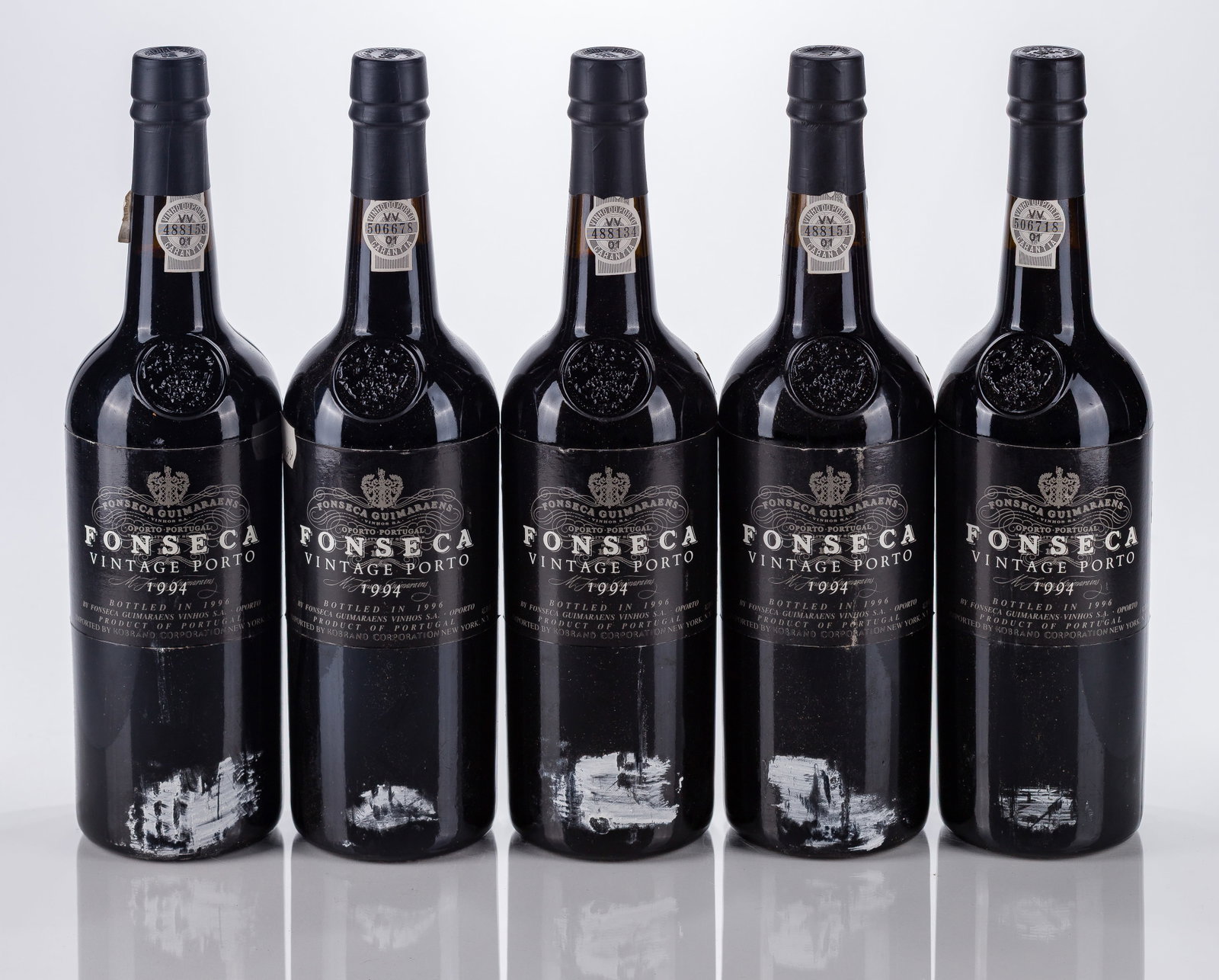 1994 Fonseca Vintage Port: 1994 Fonseca Vintage Port 1994 Fonseca Vintage Porto, bottled 1996, Oporto, Portugal (5x 750ml), fill: all N, labels: fully legible, intact having minor shelf wear, bottles having white scuffs,