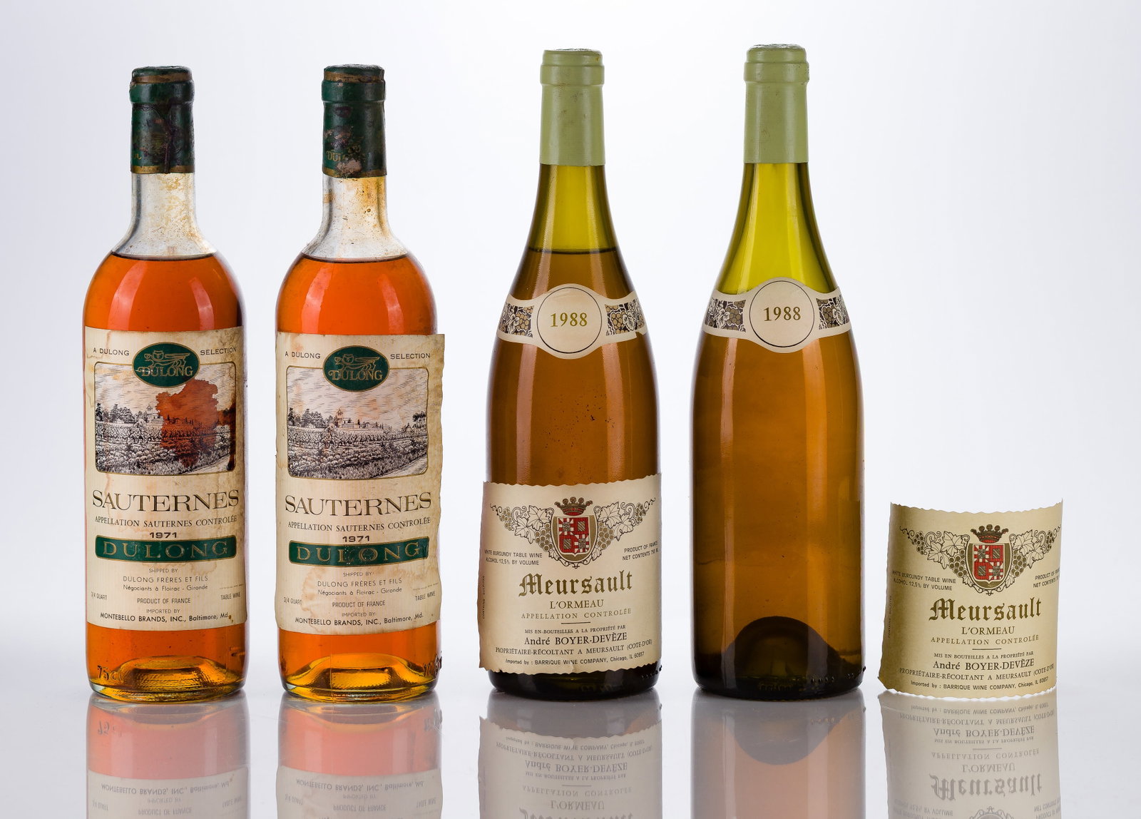 French Mixed Wines: French Mixed Wines 1971 DuLong Sauternes (2x 750ml), Sauternes, France, fill: BN, labels: fully legible, intact having bin soiling, wine stains, loose label, scuffs, capsules / corks: slightly