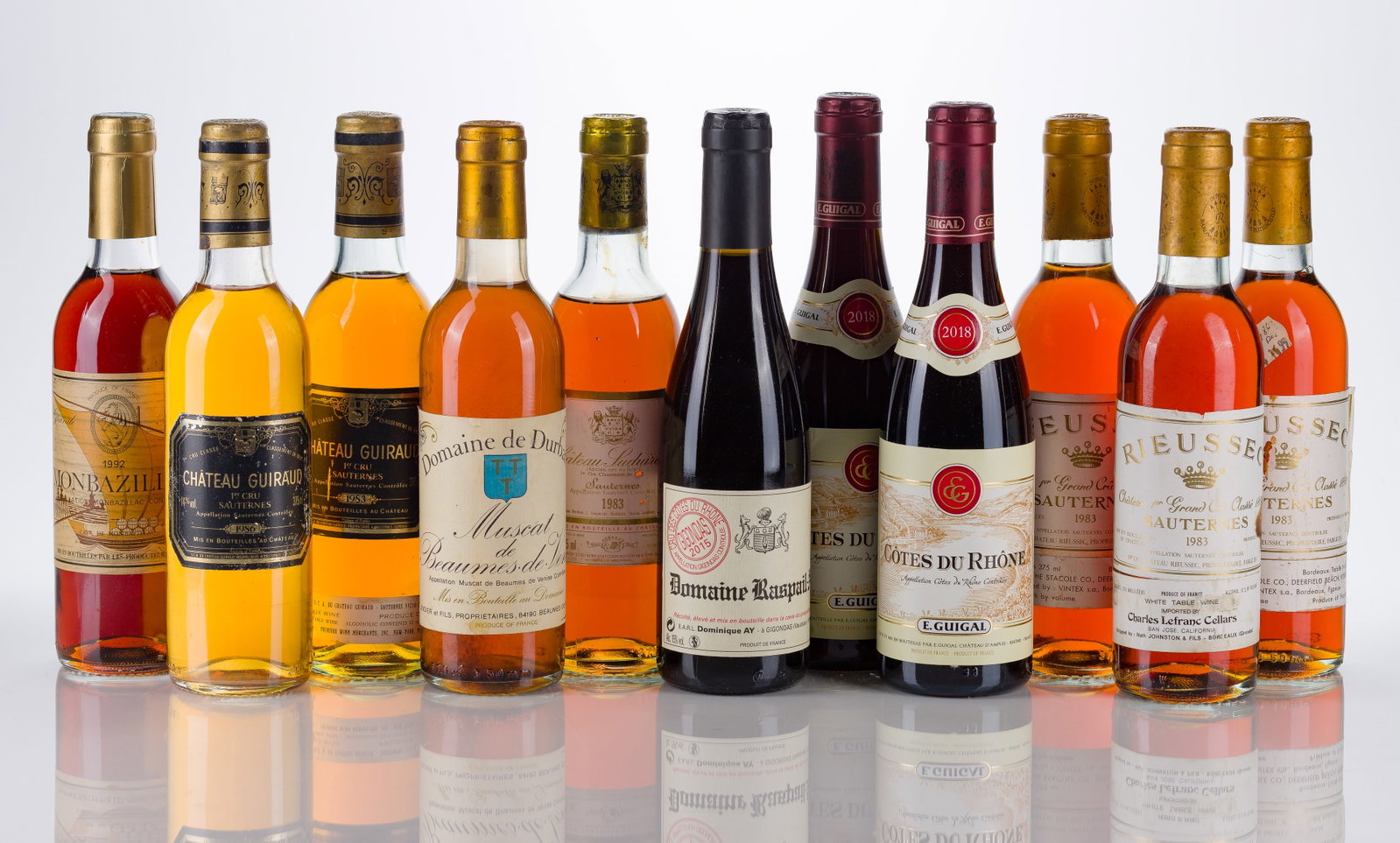 French Mixed Wines: French Mixed Wines Various wines (11x 375ml), including Sauternes, Cote d'Rhone, Gigondas and Monbazillac, fill: N / BN, labels: fully legible, intact having bin soiling, wine stains, loose label,