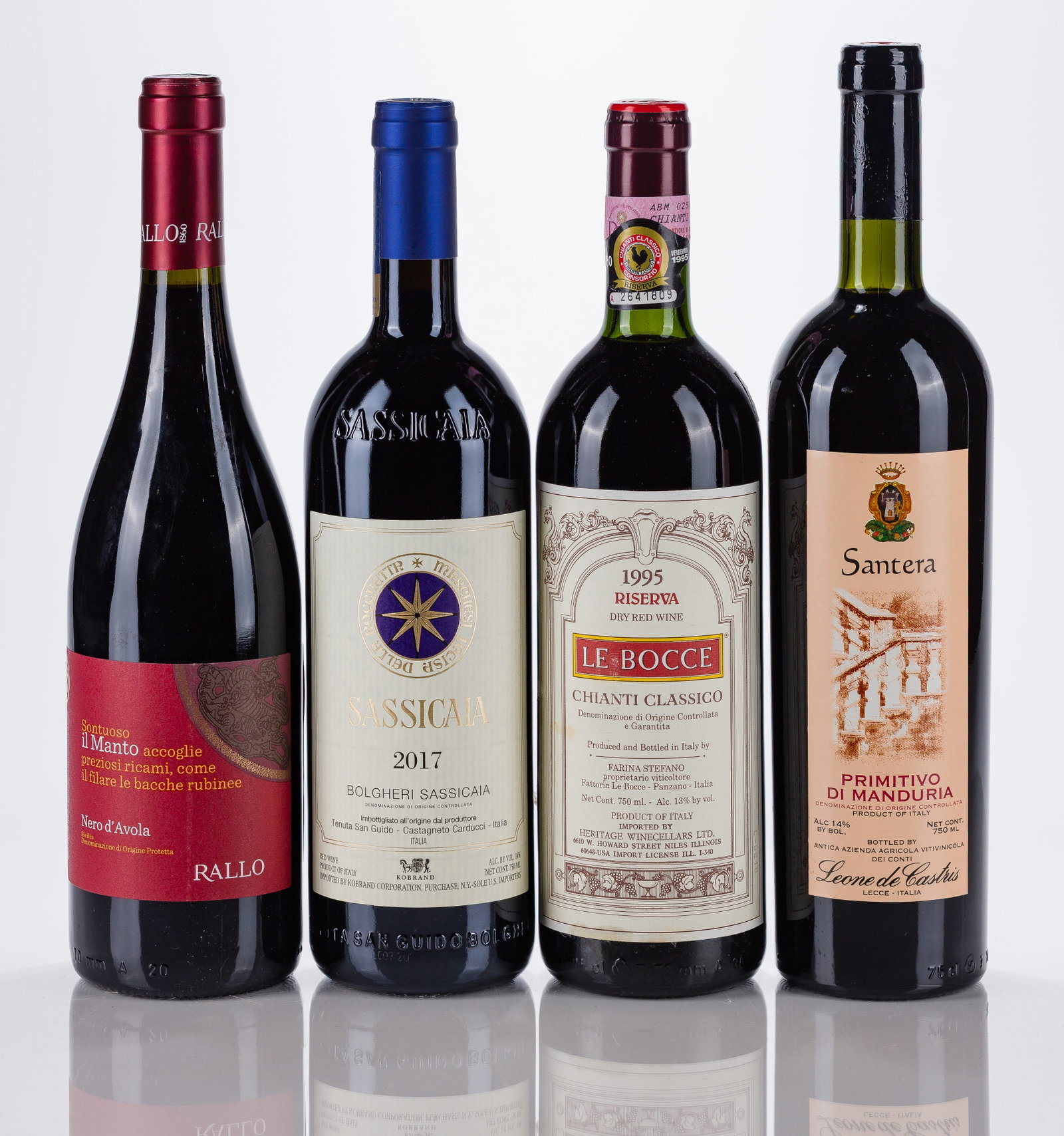 Italian Mixed Red Wines: Italian Mixed Red Wines 1995 Le Bocce (1x 750ml), 1999 Santera (1x 750ml), 2013 Il Manto (1x 750ml), 2017 Sassicaia (1x 750ml), fill: BN, labels: fully legible, intact having minor wear, capsules /