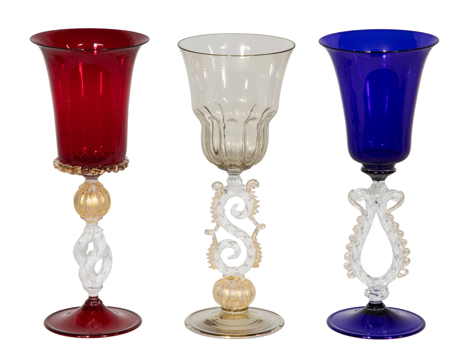 Murano Goblet Assortment: Murano Goblet Assortment (3) items including red, blue and clear glass goblets having zanfirico and gold fleck accented stems and other decorative elements Property from: a Private Collector, Chestert