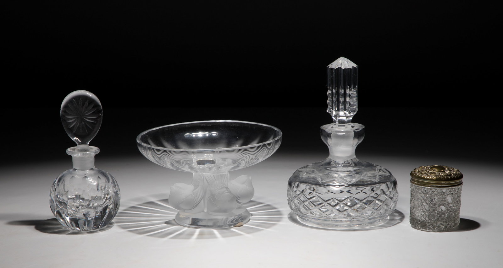 Lalique Crystal Nogent Bowl: Lalique Crystal Nogent Bowl (4) total items including a Lalique frosted crystal Nogent bowl, engraved mark; together with (2) perfume bottles and a vanity jar Property from: a Private Collector,