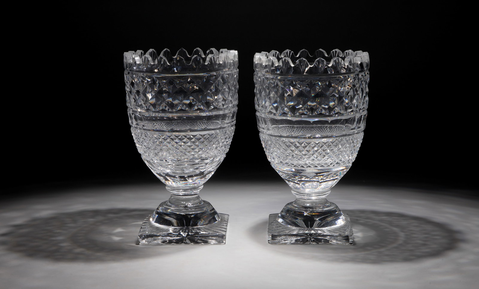 Waterford Crystal Vases: Waterford Crystal Vases A pair having a diamond and sunburst cut, marked on undersides Property from: a Private Collector, Wheaton, Illinois Height: 10 1/2 inches, Diameter: 6 1/8 inches Condition: