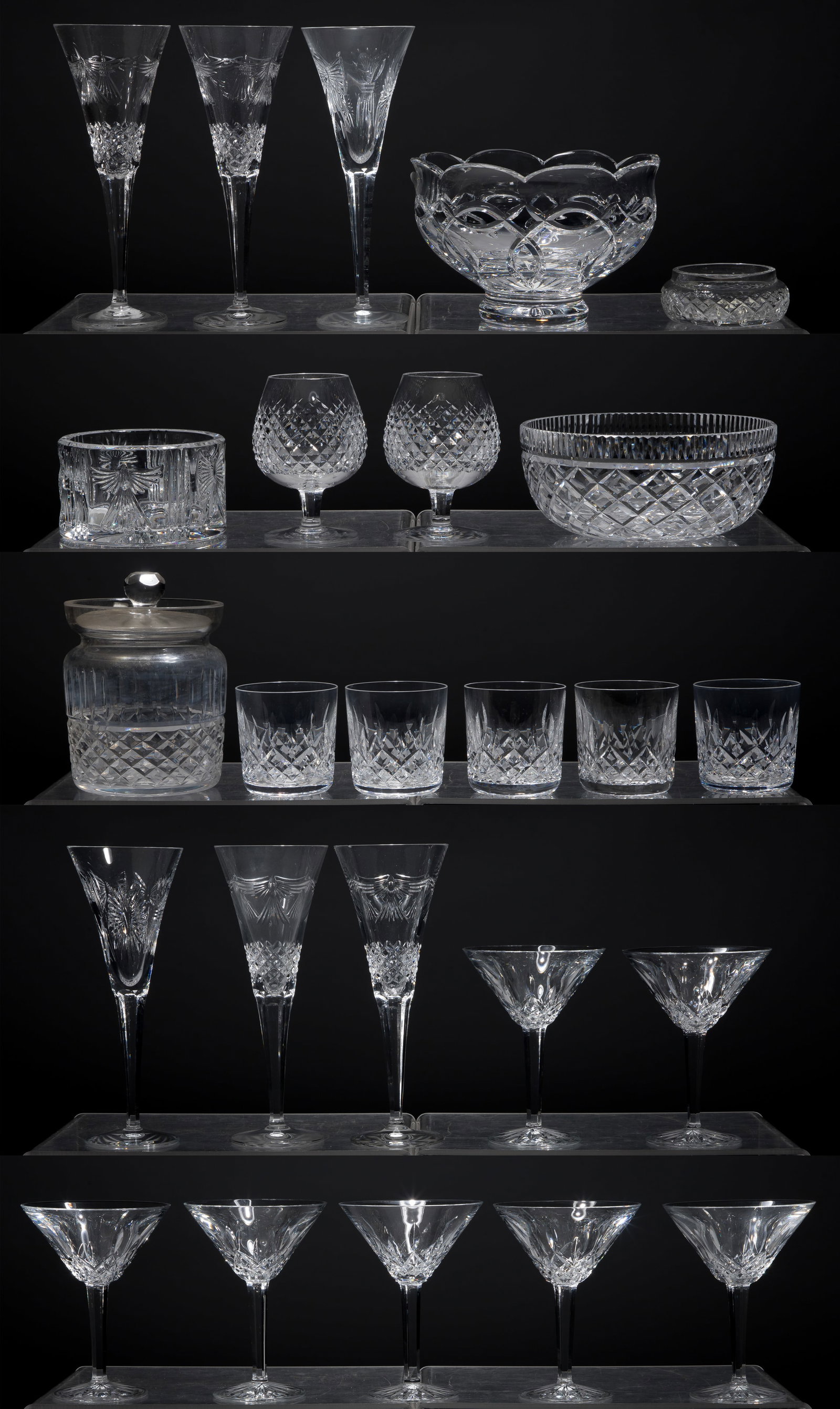 Waterford Crystal Assortment: Waterford Crystal Assortment (25) items including a set of (6) toasting flutes, a champagne coaster, a lidded bowl, all from the Millennium Collection, a bowl from the Clannad pattern, (2) brandy snif