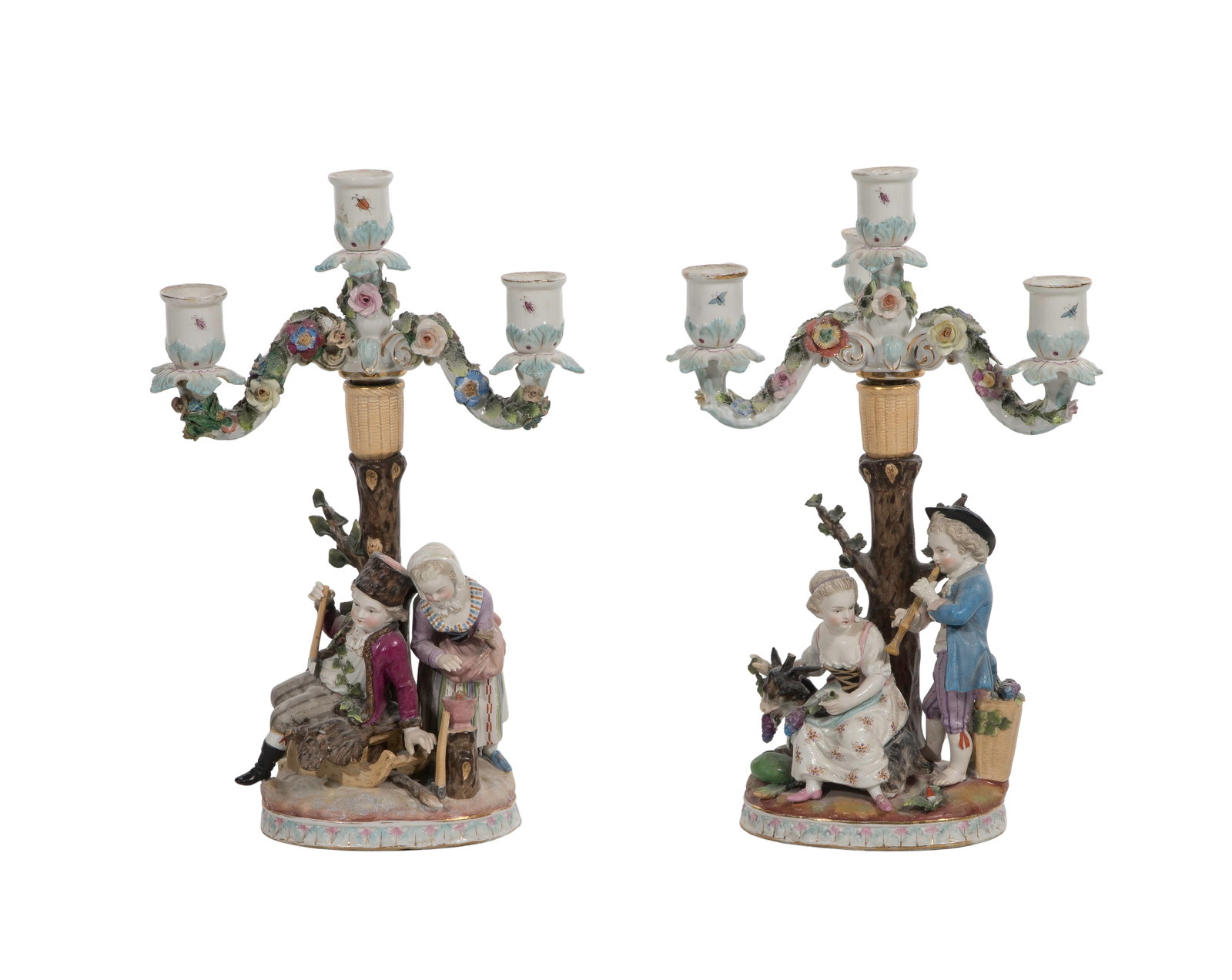 Sitzendorf Figural Porcelain Candelabras: Sitzendorf Figural Porcelain Candelabras (2) items consisting of figural bases having cross marks emulating Meissen crossed swords underside, removable floral motif 4-light arms Property from: a Priva