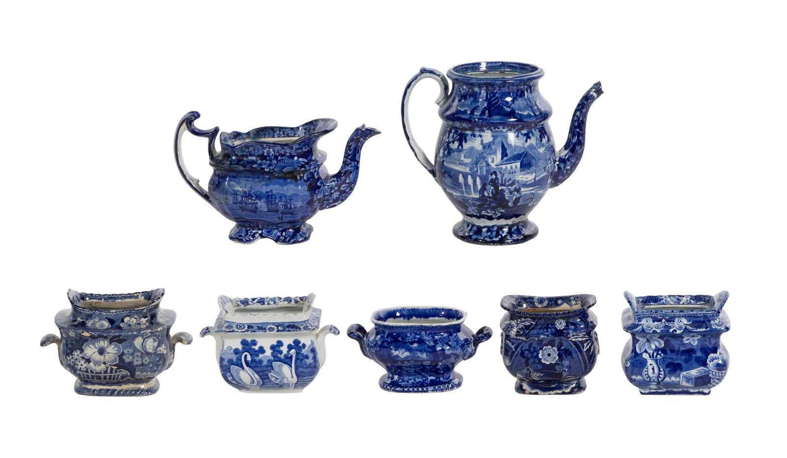 Continental Porcelain Assortment: Continental Porcelain Assortment (7) flow blue transferware items including (2) spouted pots and (5) sugar bowls, some having illegible impressed markings on the underside Property from: a Private