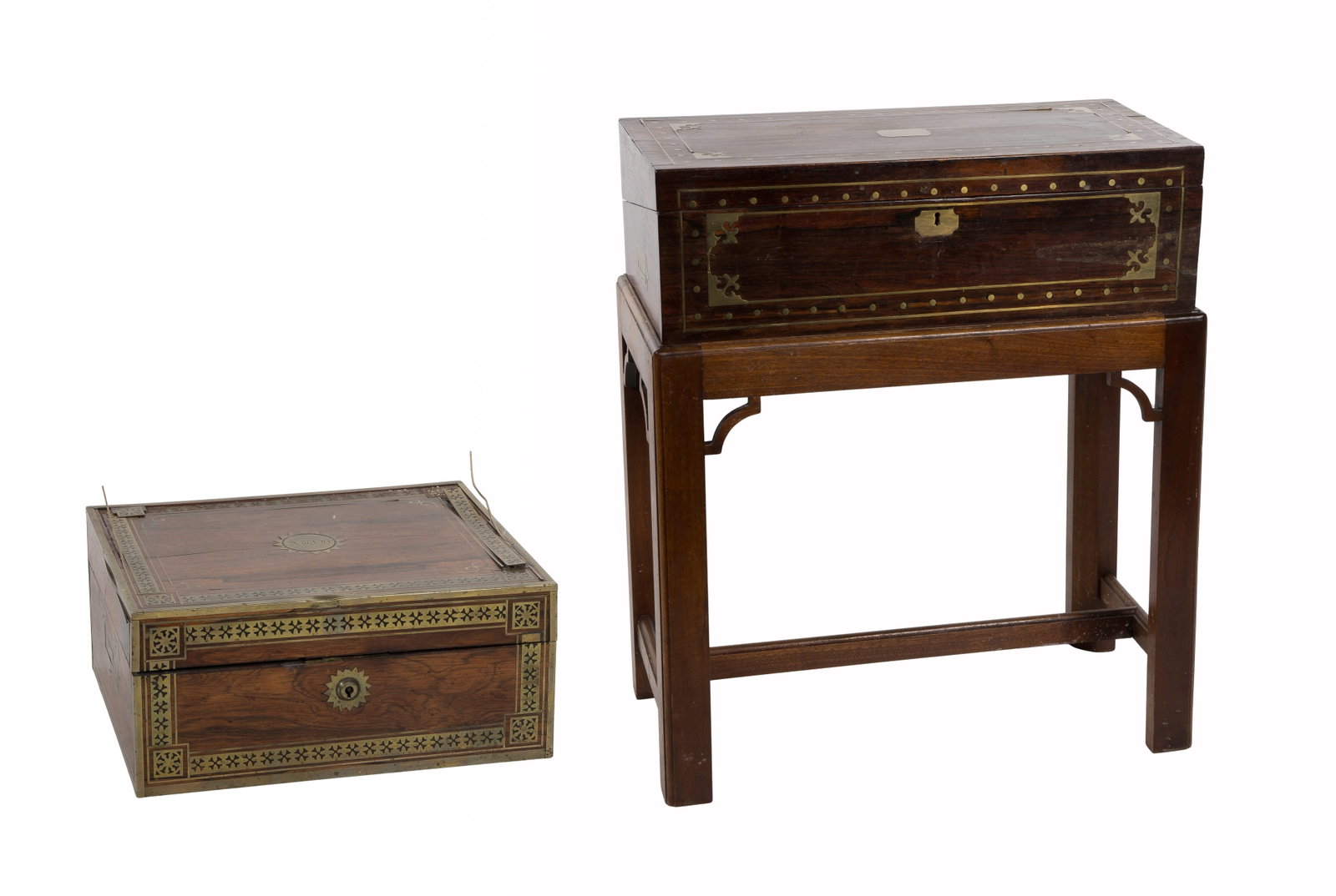 British Traveling Desk and Vanity Chest: British Traveling Desk and Vanity Chest (2) items, both of brass inlaid rosewood, including the traveling vanity having an array of bottles, rectangular canisters and compartments as well as the desk 