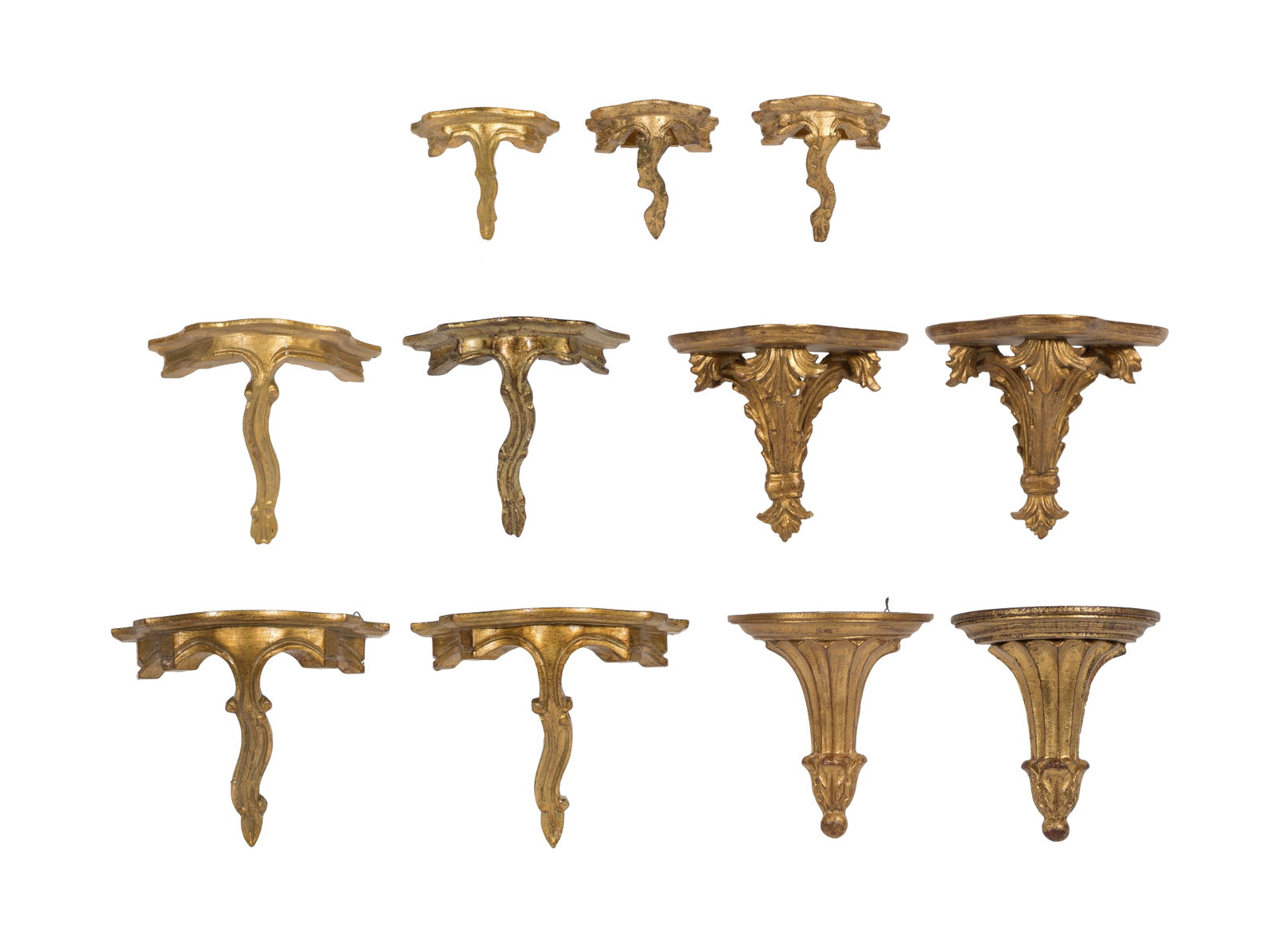 Wall Bracket Assortment: Wall Bracket Assortment (11) items including (5) pairs and a singular Italian Rococo style giltwood wall brackets having hand carved scrolling, some retaining original labels Property from: a Private