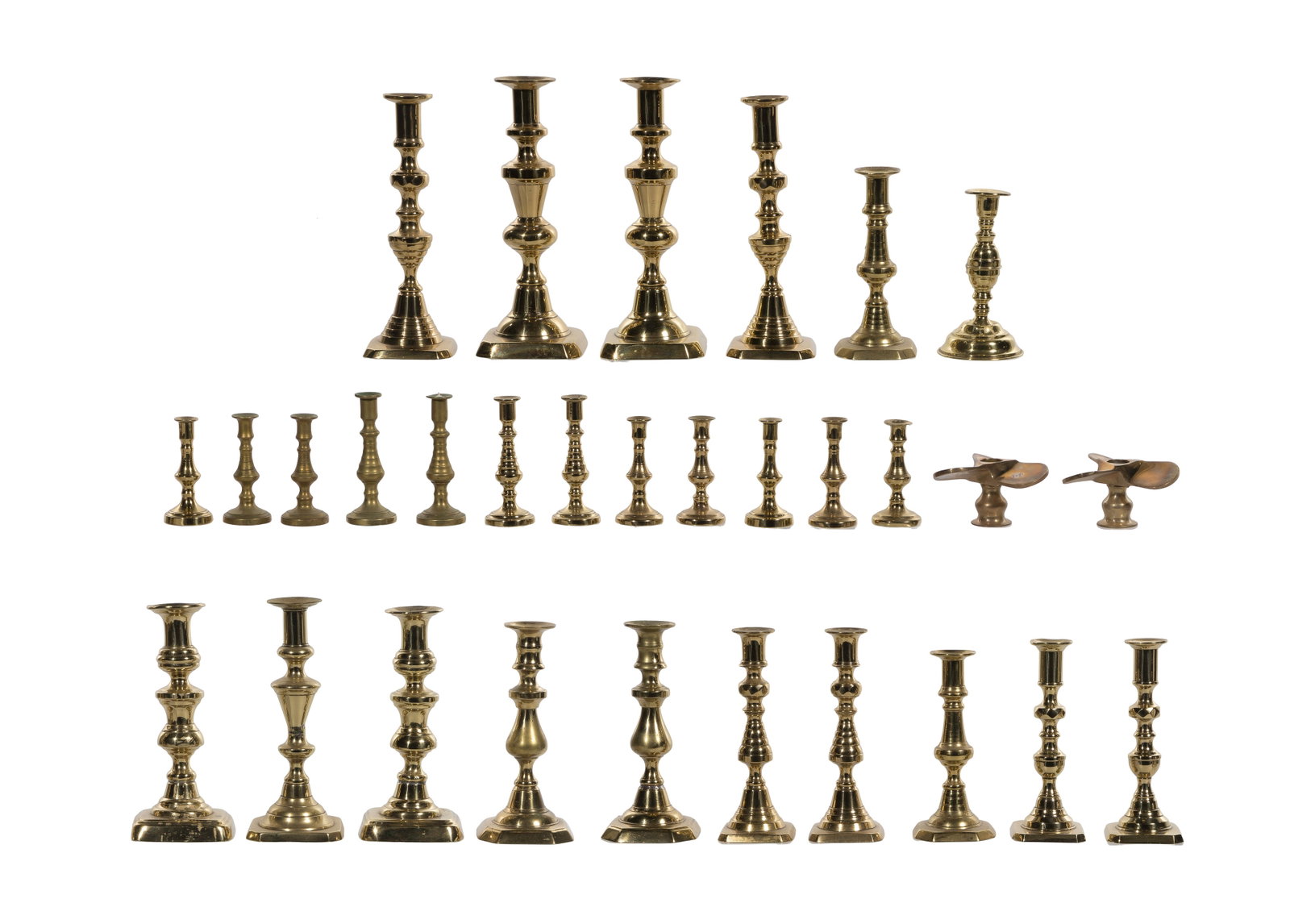 Brass Candlestick Assortment: Brass Candlestick Assortment (30) items of various sizes, mostly baluster form, including (14) pairs and (2) singles Property from: a Private Collector, Wheaton, Illinois Height: 10 3/8 inches,