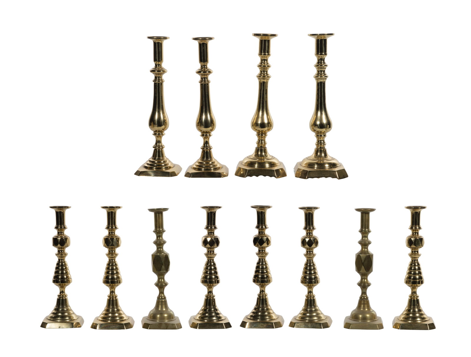 Brass Candlestick Assortment: Brass Candlestick Assortment (12) items including (3) pairs marked 'England / No.2223580' and (3) unmarked pairs Property from: a Private Collector, Wheaton, Illinois Height: 16 1/2 inches, Width: 6