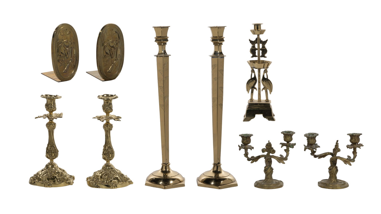 Decorative Brass Object Assortment: Decorative Brass Object Assortment (9) items including a pair of tall engraved hexagonal single-light candlesticks, a pair of Rococo style single-light candlesticks, a pair of Rococo style 2-light can