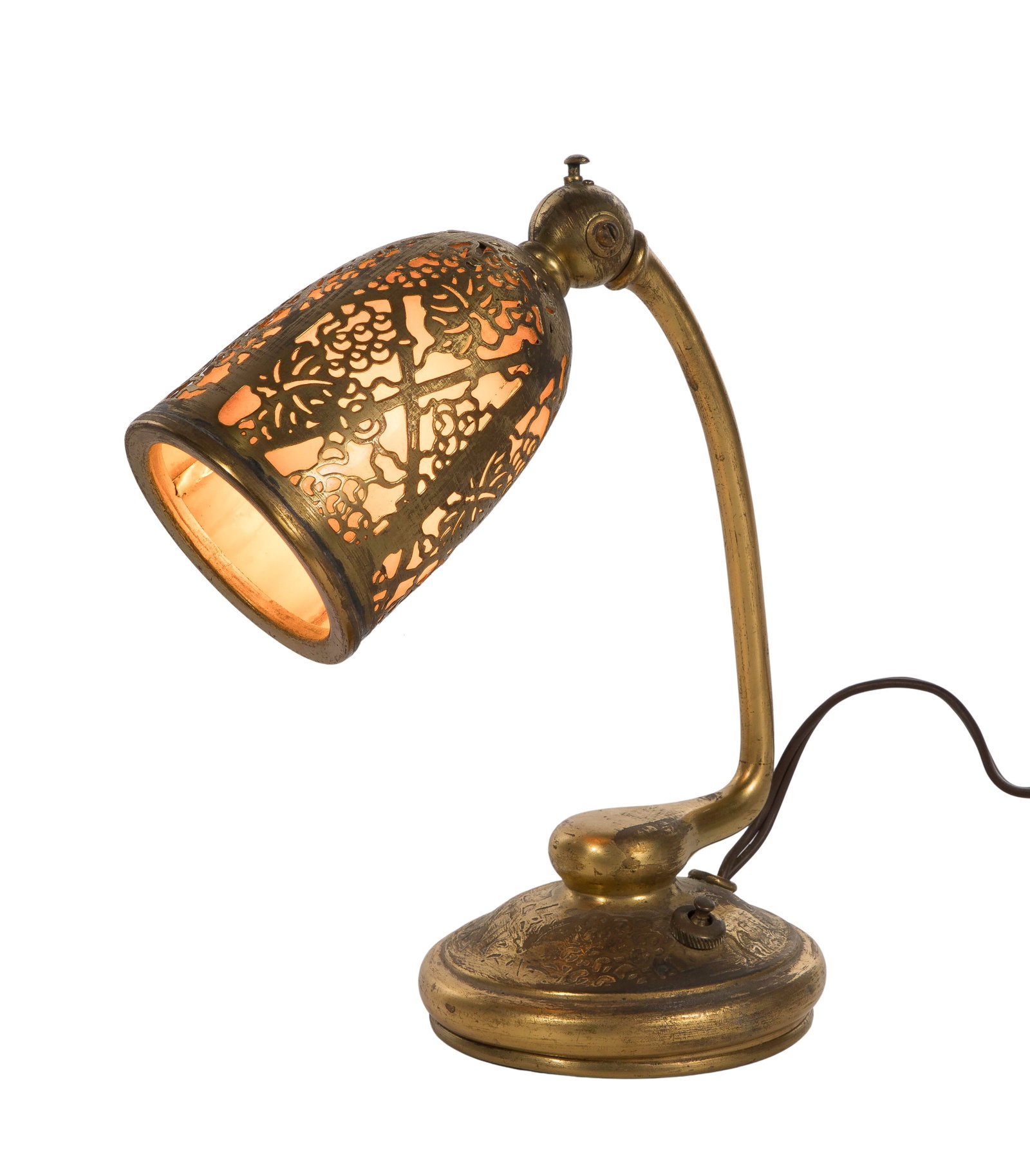 Tiffany Studios #552 Grapevine Desk Lamp: Tiffany Studios #552 Grapevine Desk Lamp c.1920, gilt bronze having adjustable openwork bronze over 4-panel slag glass shade, single socket, marked 'Tiffany Studios / New York / 552' underside of