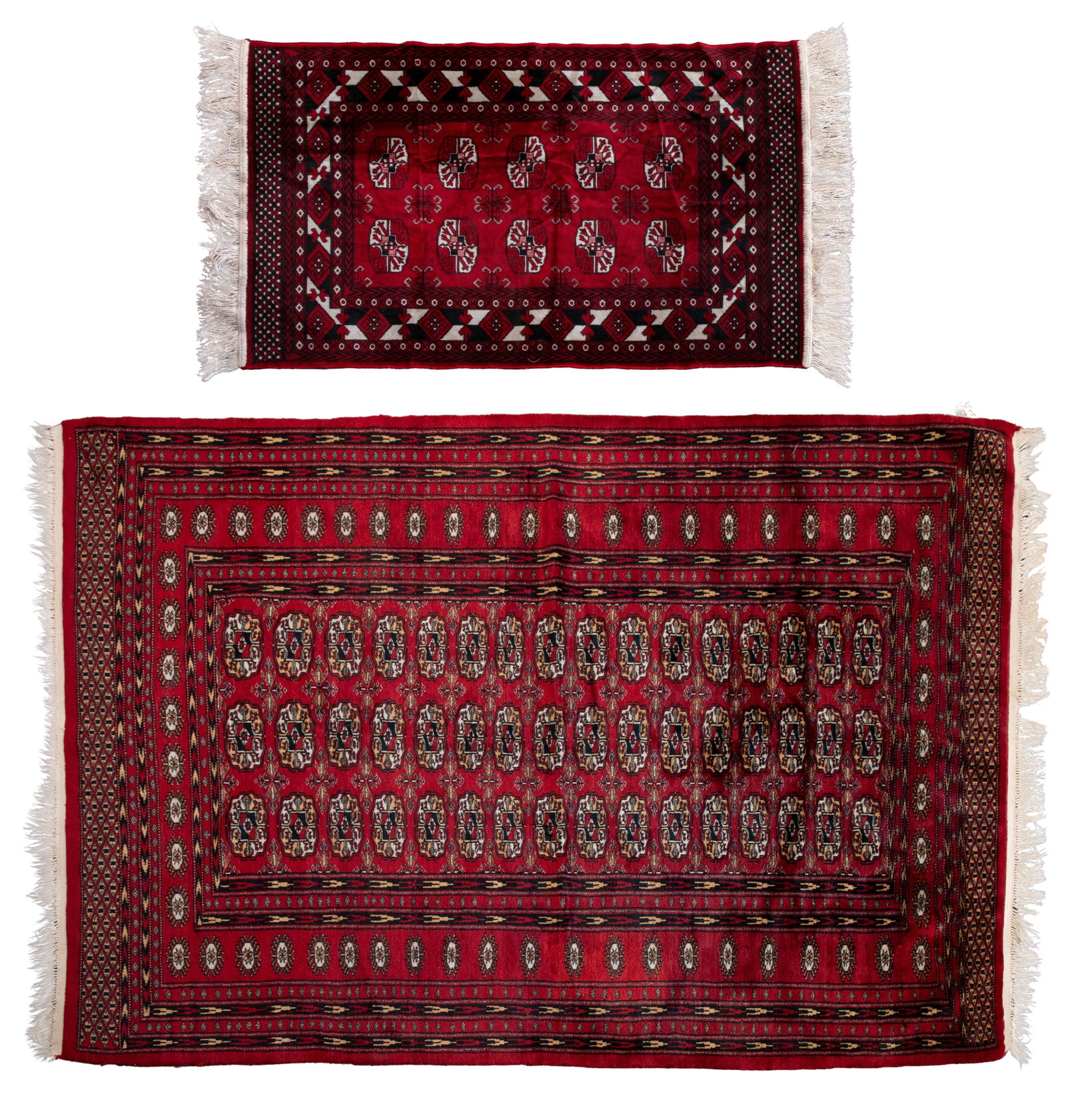 Bokhara Style Wool Rugs: Bokhara Style Wool Rugs (2) items having abstract geometric designs in hues of cream, black and tan on red fields, smaller mat (3 ft. 5 in. x 2 ft. 2 in.) Property from: an Estate, Wauconda, Illinois