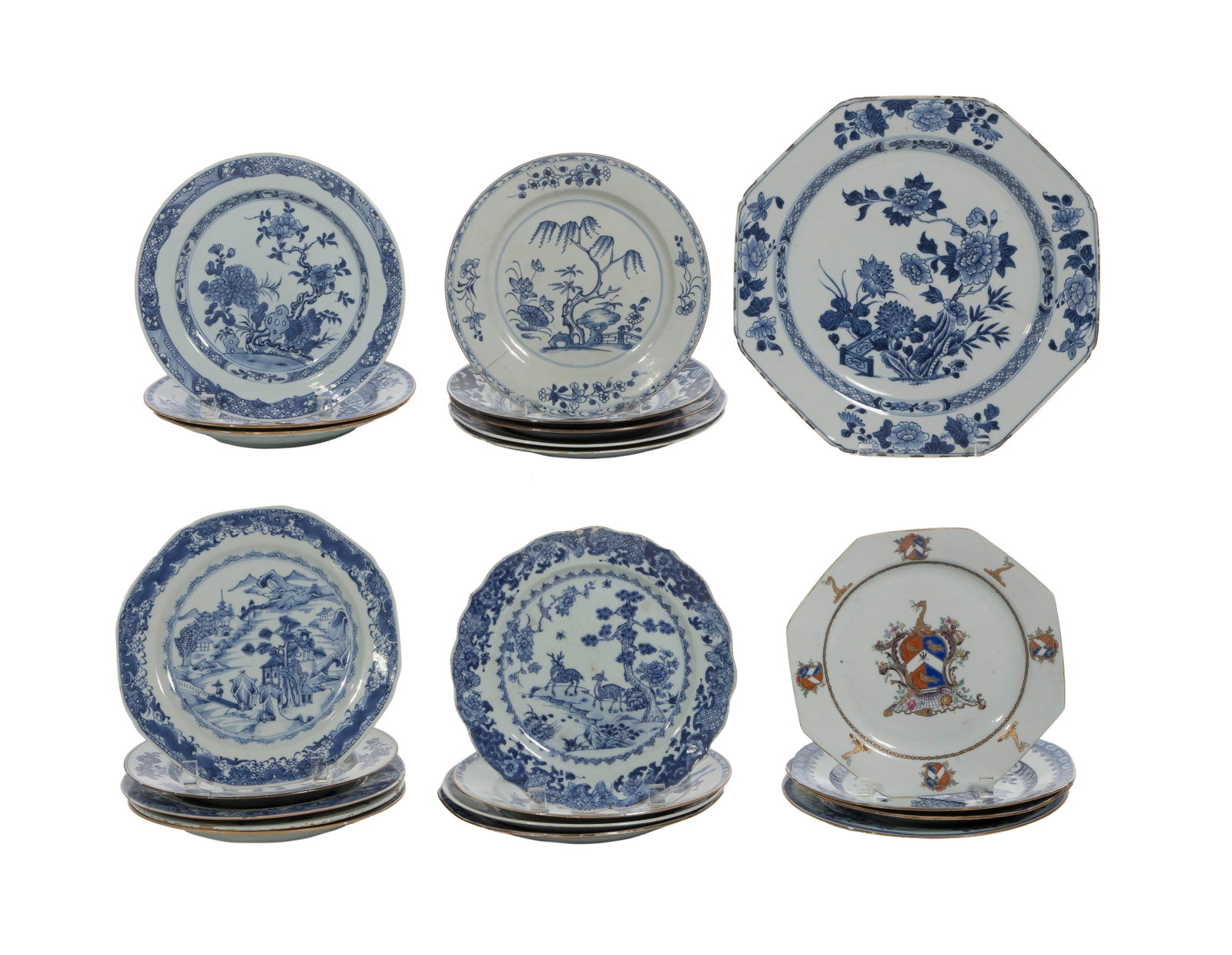 Chinese Export Blue and White Porcelain Assortment: Chinese Export Blue and White Porcelain Assortment (22) items including plates and dishes having underglaze blue and white floral and landscape motifs and an armorial crest design Property from: a Pri