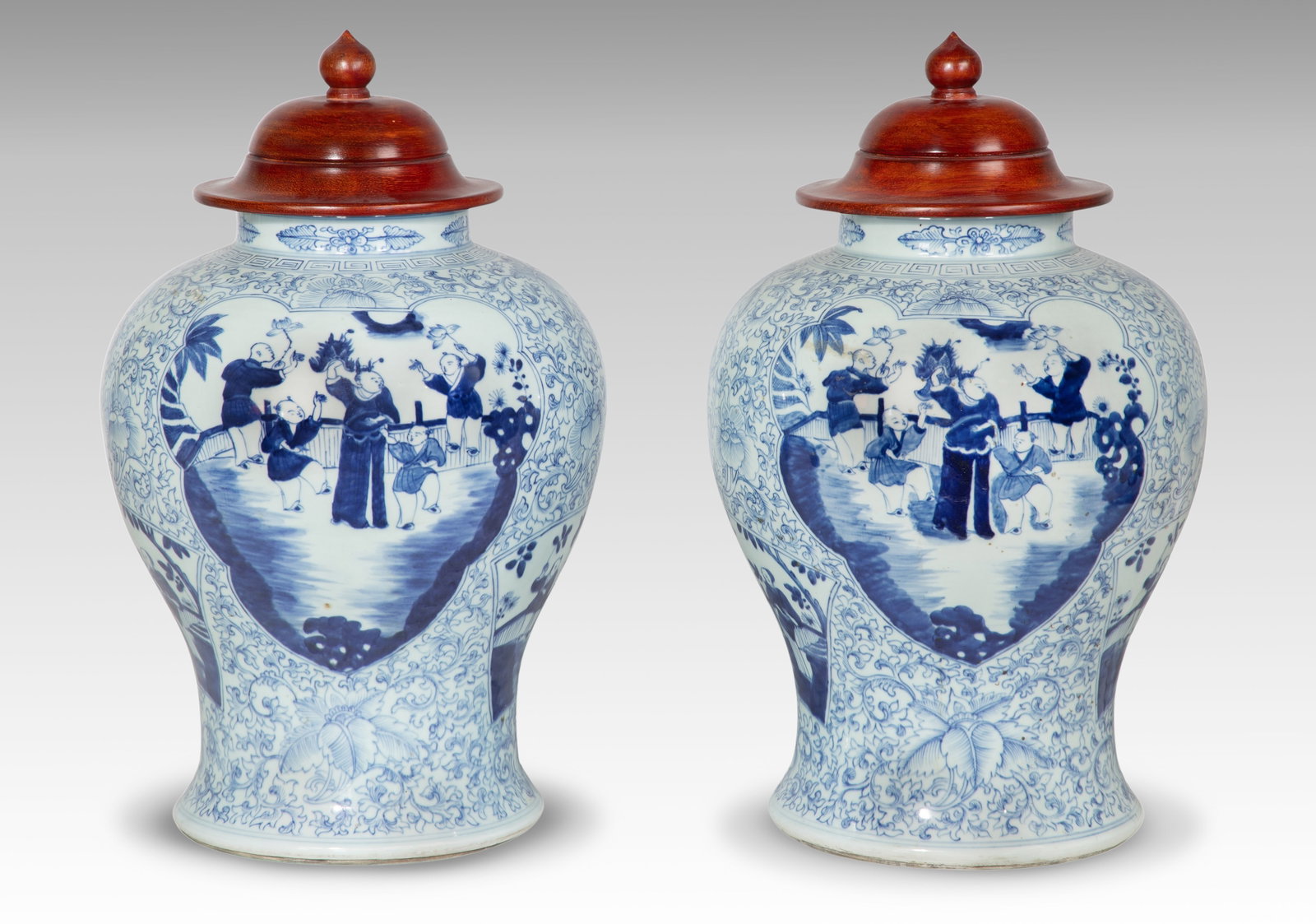 Chinese Blue and White Porcelain Baluster Jars: Chinese Blue and White Porcelain Baluster Jars (2) items comprising a matching pair having underglaze blue playing boys motif and wood replacement lids (adding 3.5-inches to height), unglazed foot rim