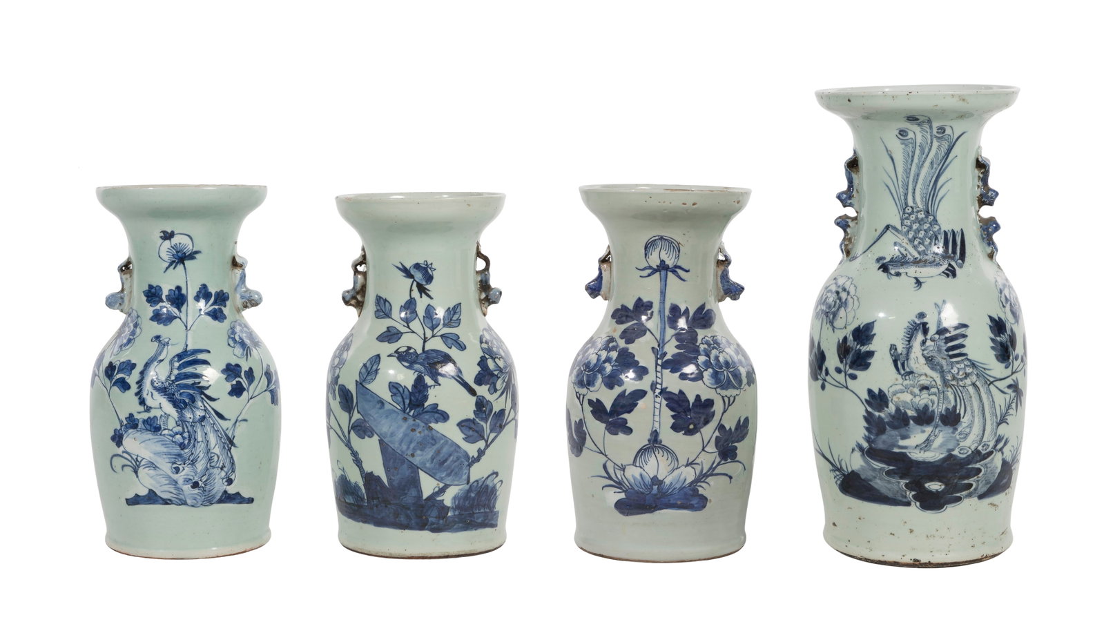 Chinese Blue and White Porcelain Vases: Chinese Blue and White Porcelain Vases (4) items, having underglaze blue decoration on an off-white / celadon ground, foo lion handles below cupped mouths, the larger having phoenix and peony motif