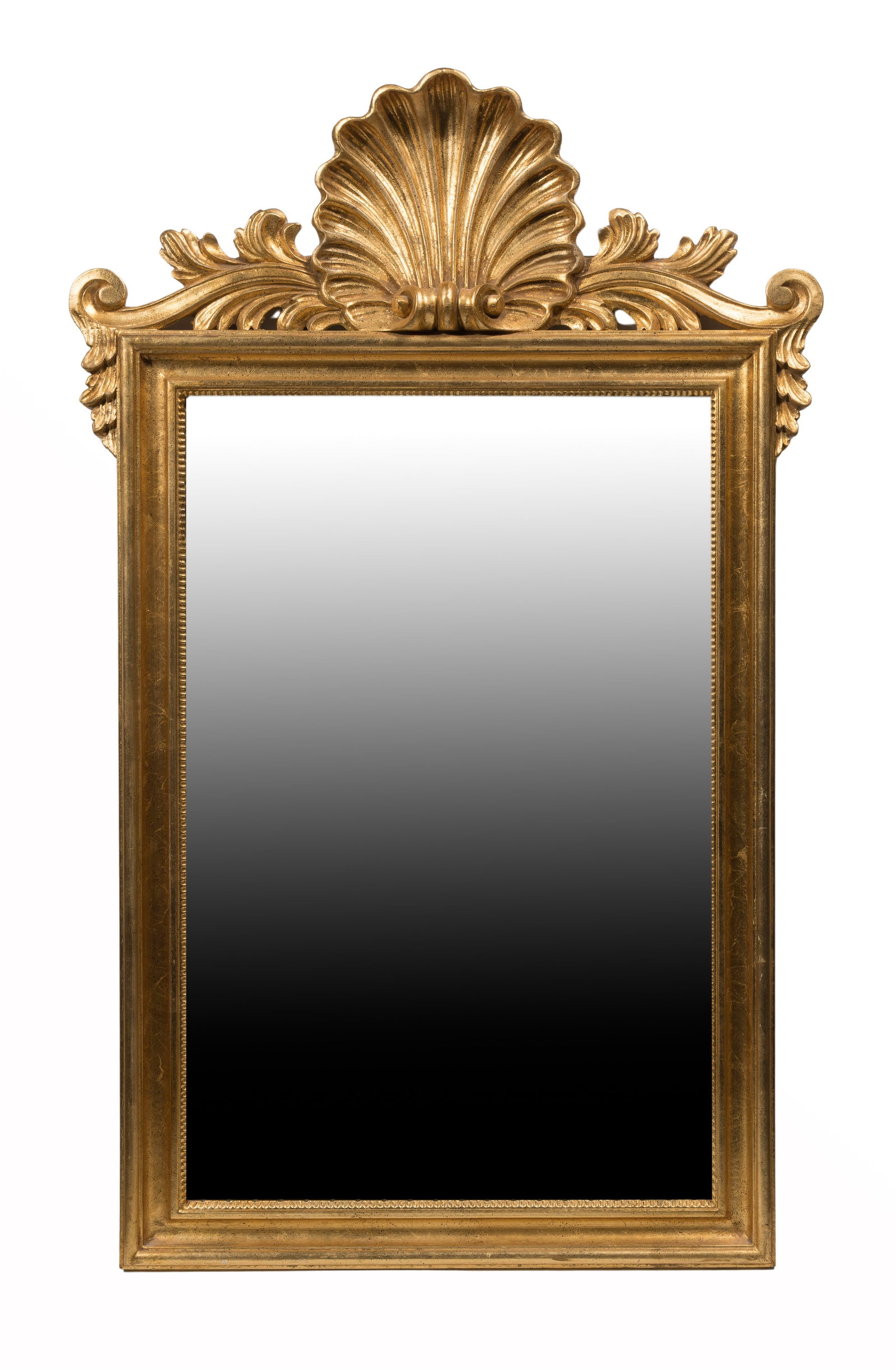 Ethan Allen Gilt Wood Wall Mirror: Ethan Allen Gilt Wood Wall Mirror Having a scallop shell crest, the gold-tone finish having overall intentional speckling to suggest age, retaining Ethan Allen label verso reading 'Made in Italy / RN4
