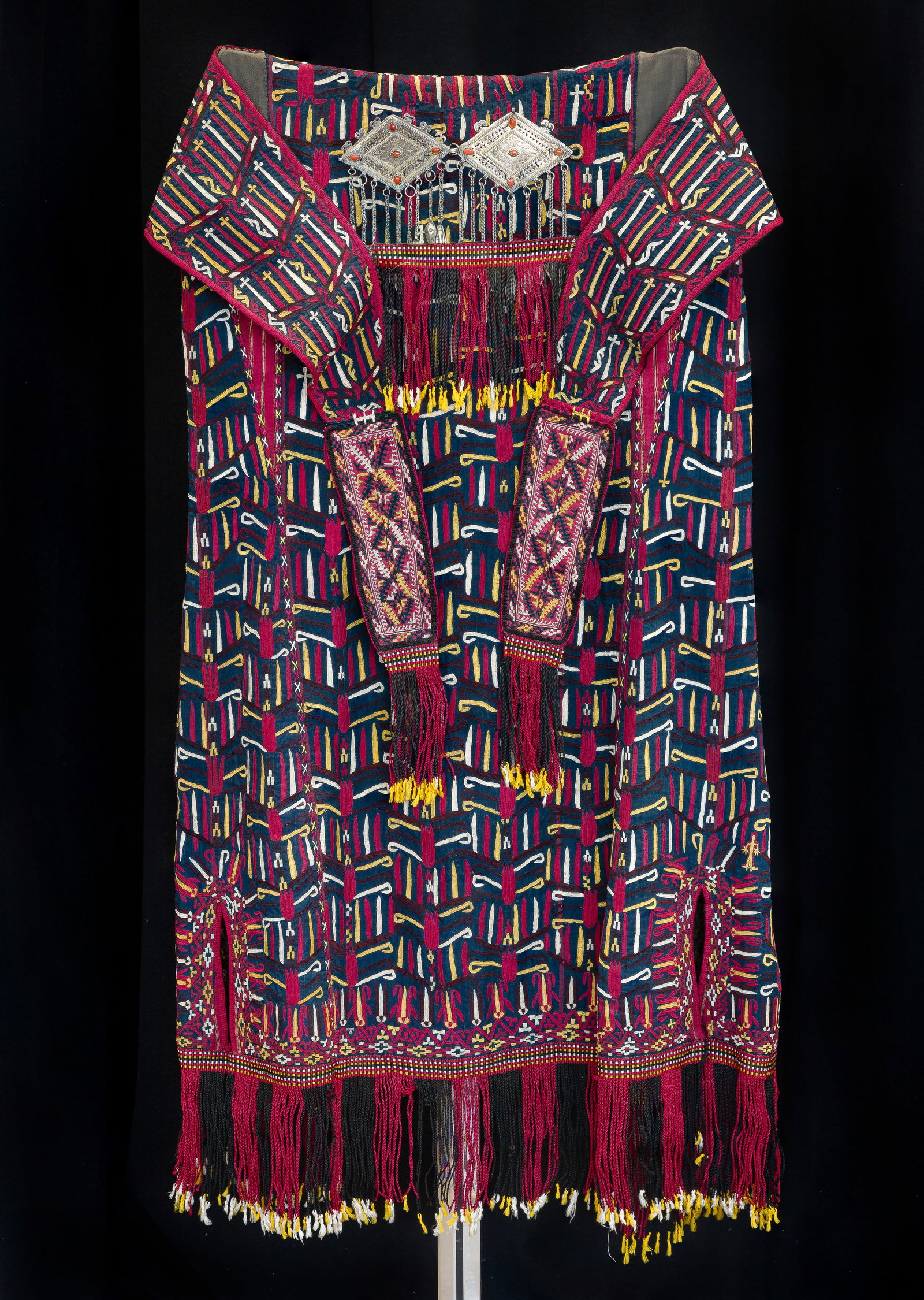 Tekke Turkmen Chyrpy Mantle: Tekke Turkmen Chyrpy Mantle (3) total items including the ceremonial coat, worn over the head, the vestigial sleeves hanging down the back, of black silk / cotton having multi-color silk and cotton ap
