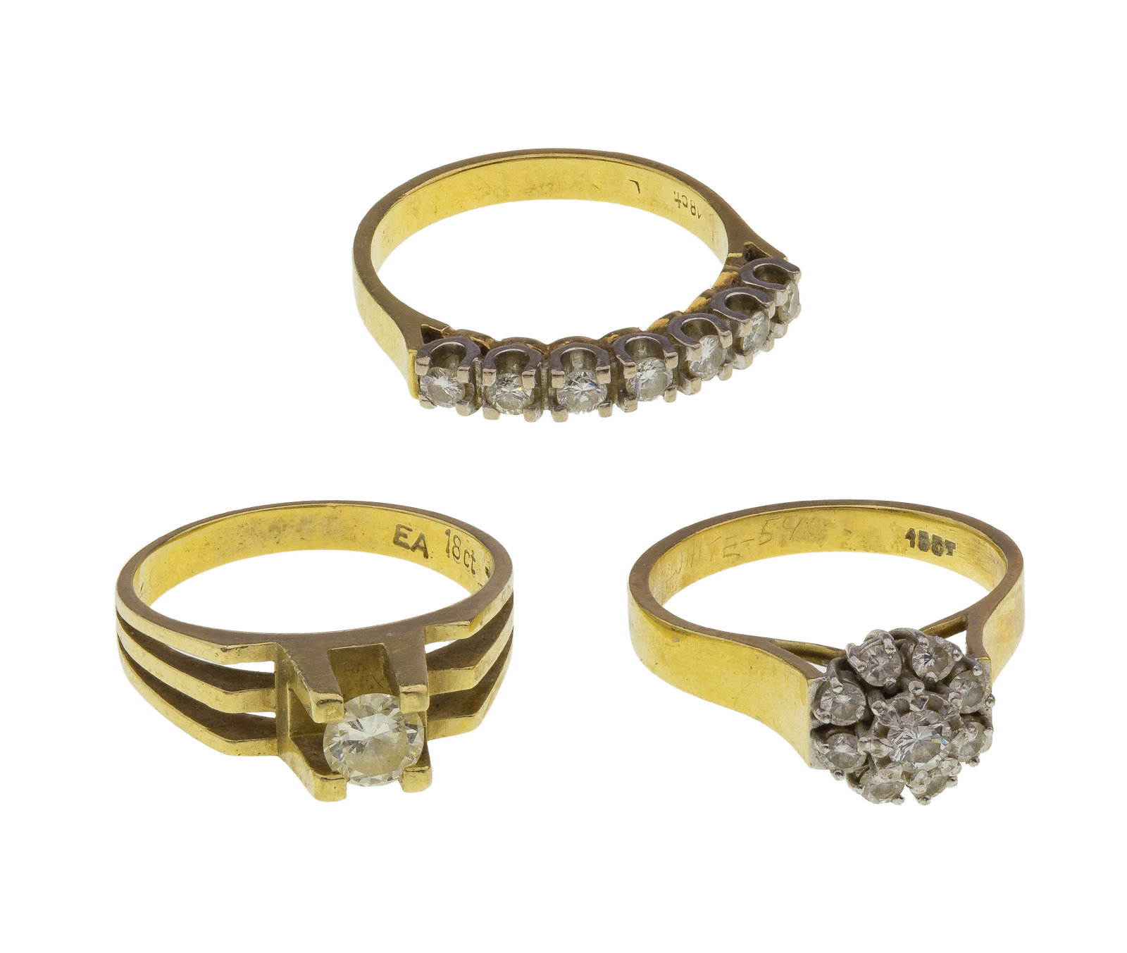 18k Yellow Gold Ring Assortment: 18k Yellow Gold Ring Assortment (3) items including a half eternity band style having seven round cut diamonds, a round cut diamond solitaire set in a four-prong architectural band and a gold cluster