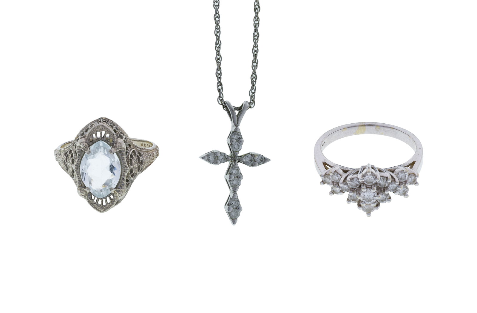 14k White Gold and Gemstone Assortment: 14k White Gold and Gemstone Assortment (3) items including an Art Deco style ring having a blue tourmaline, a floral cluster ring having round cut diamonds and a necklace having a cross pendant adorne