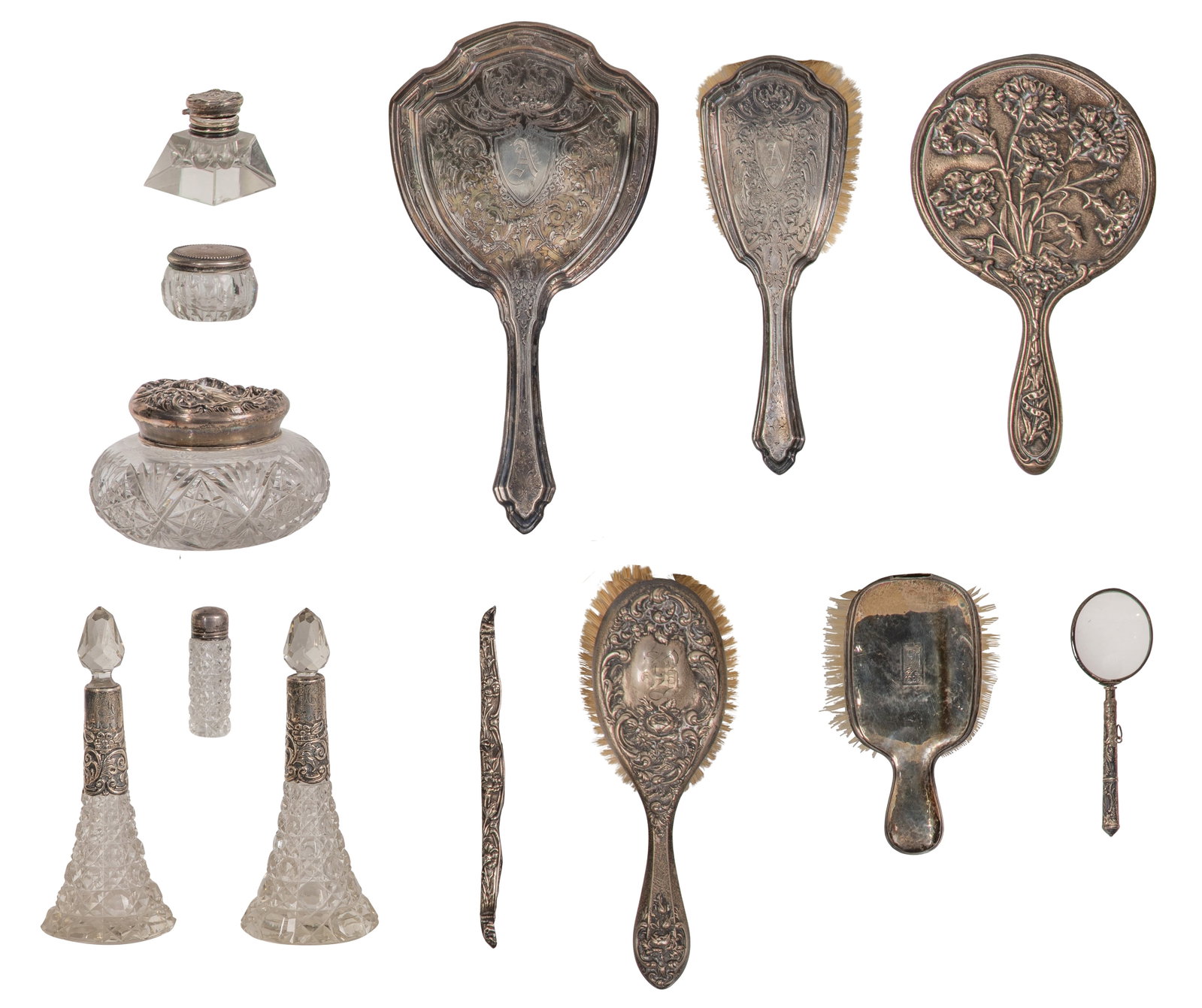 Sterling Silver and Silverplate Vanity Object Assortment: Sterling Silver and Silverplate Vanity Object Assortment (13) items of various shapes, sizes and uses such as mirrors, brushes, combs, jars, perfume bottles (most marked 'sterling') Property from: a P