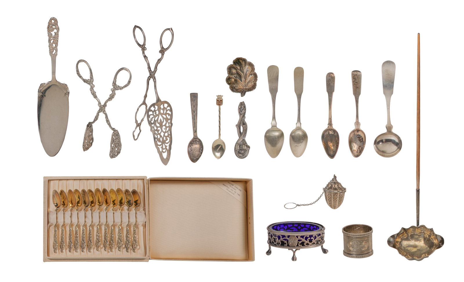 Sterling Silver and European Silver (830, 800) Object Assortment: Sterling Silver and European Silver (830, 800) Object Assortment Including napkin ring, tongs, spoons, a ladle, a tea ball (most marked 'sterling'), spoons, salt cellar, a ladle (unmarked 0.830 and