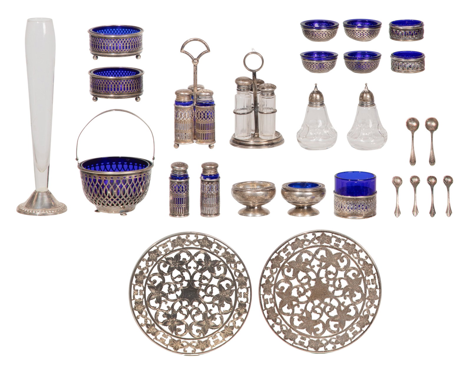 Sterling Silver Object Assortment: Sterling Silver Object Assortment (31) items including (8) salt cellars, (4) master salt, (2) sets of three shakers, (2) pairs of salt and pepper shakers, salt spoons, a vase and two trivets (all