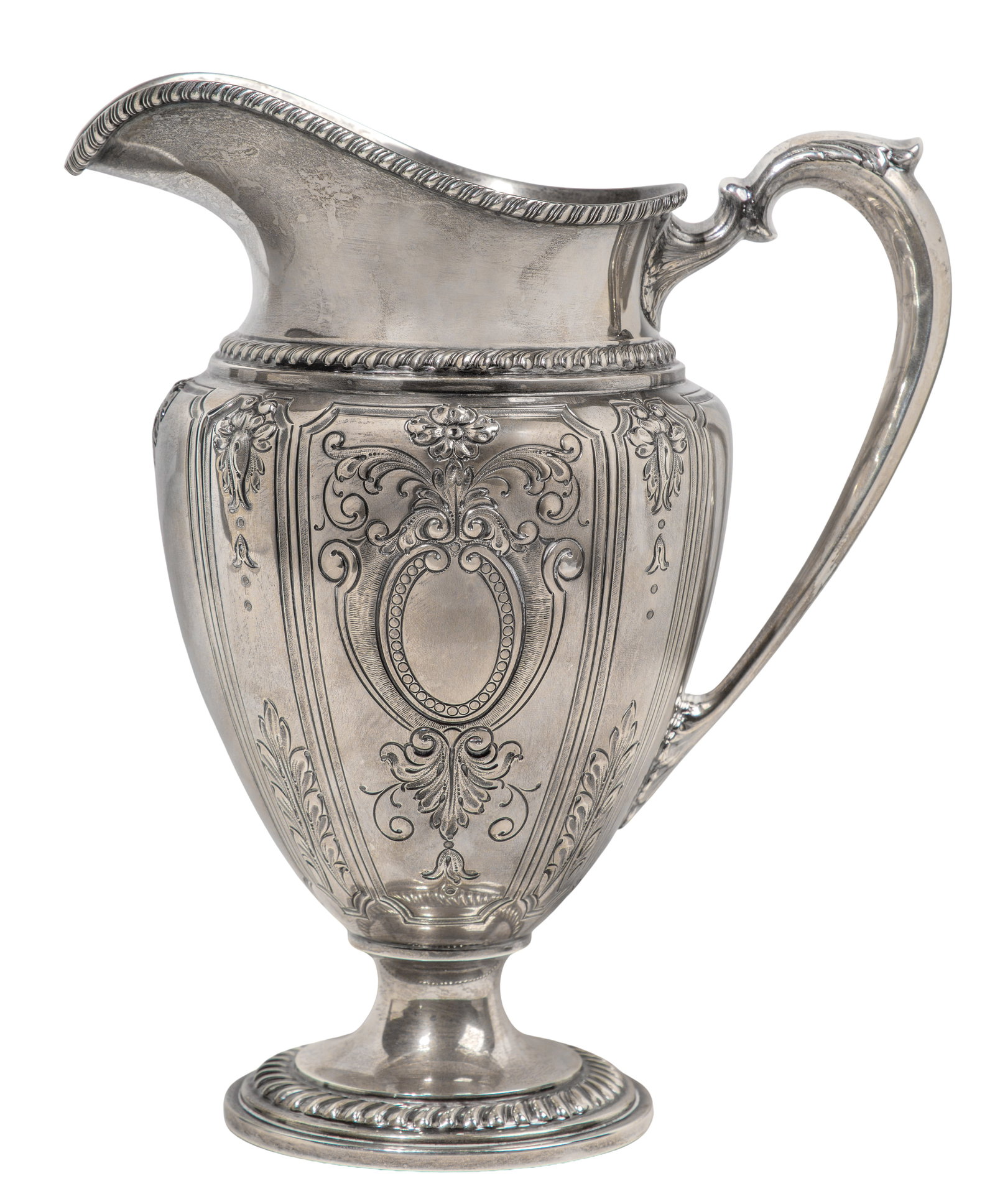 Frank M. Whiting Company Renaissance Sterling Silver Pitcher: Frank M. Whiting Company Renaissance Sterling Silver Pitcher A hand chased water pitcher having floral and scroll motif (hallmarked and marked 'sterling') Property from: a Private Collector, Wheaton,
