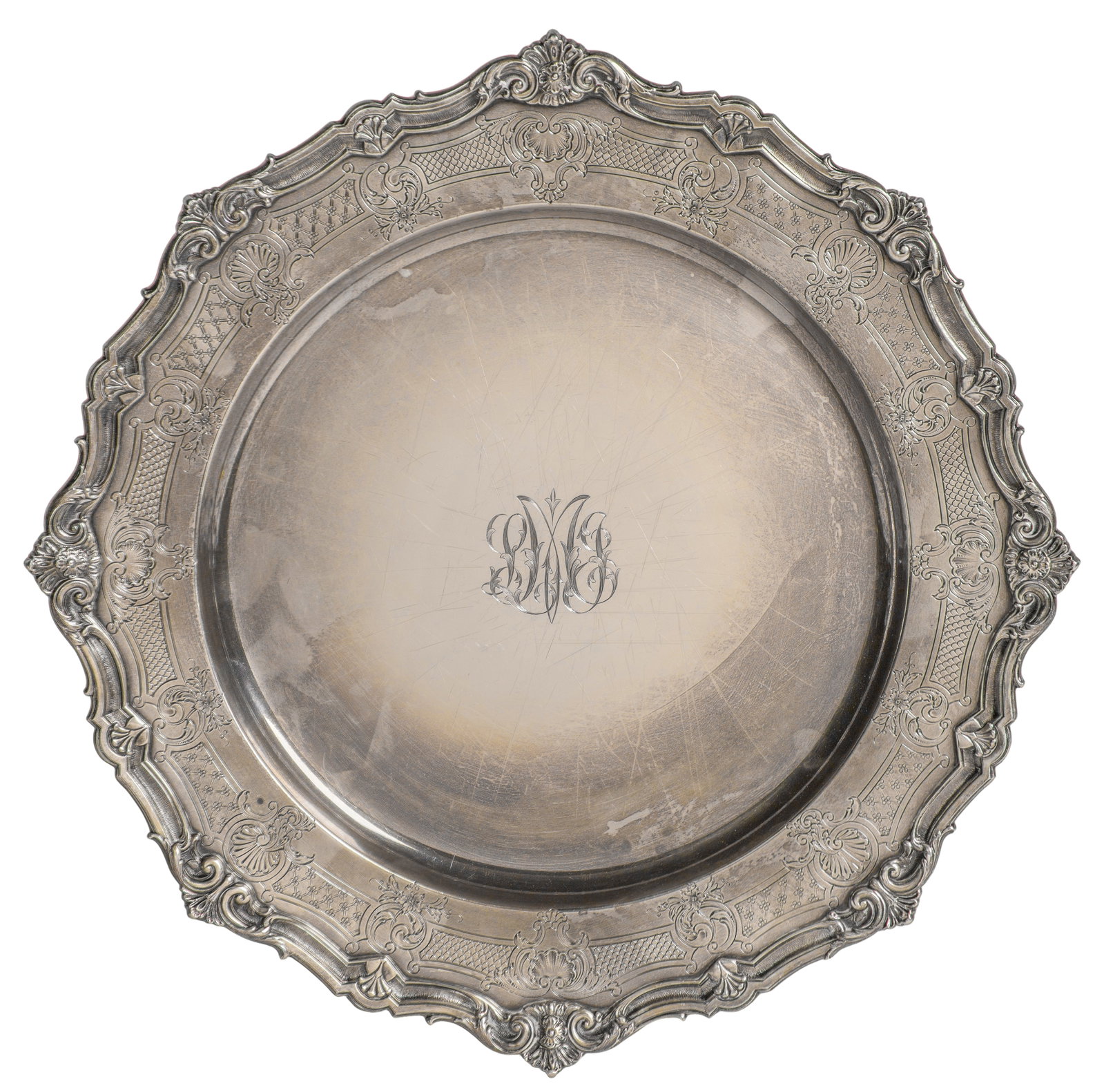 Gorham Sterling Silver Tray: Gorham Sterling Silver Tray Round having a shell and scroll scalloped rim, engraved scrollwork (marked 'sterling') Property from: a Private Collector, Wheaton, Illinois Diameter: 15 1/2 inches Weight: