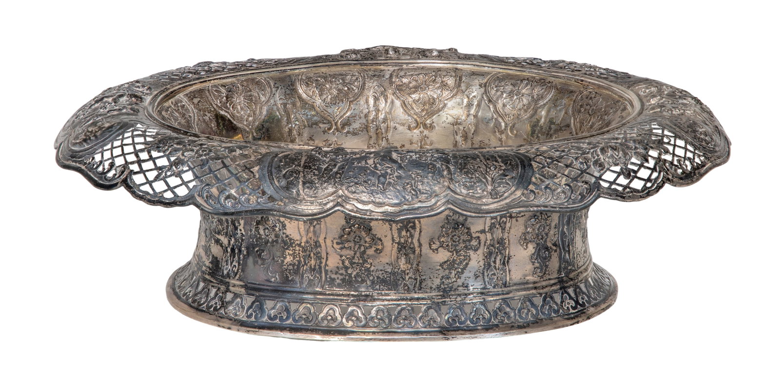 Germany Sterling Silver Pierced Rim Repousse Bowl: Germany Sterling Silver Pierced Rim Repousse Bowl An ornately decorated and reticulated centerpiece having a recurving rim and flaring foot (marked '930') Property from: an Estate, Hinsdale, Illinois 