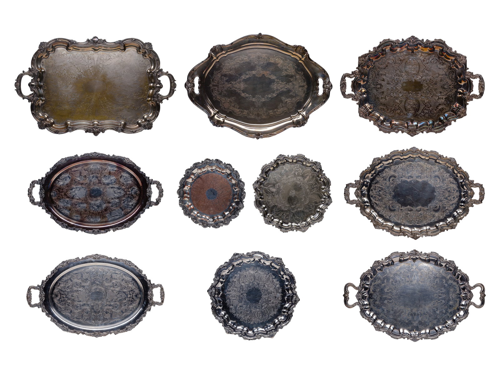 Silverplate Serving Tray Assortment: Silverplate Serving Tray Assortment (10) items having various designs, some produced by Wallace, Community and Barbour Property from: a Private Collector, Wheaton, Illinois Height: 1 3/4 inches,