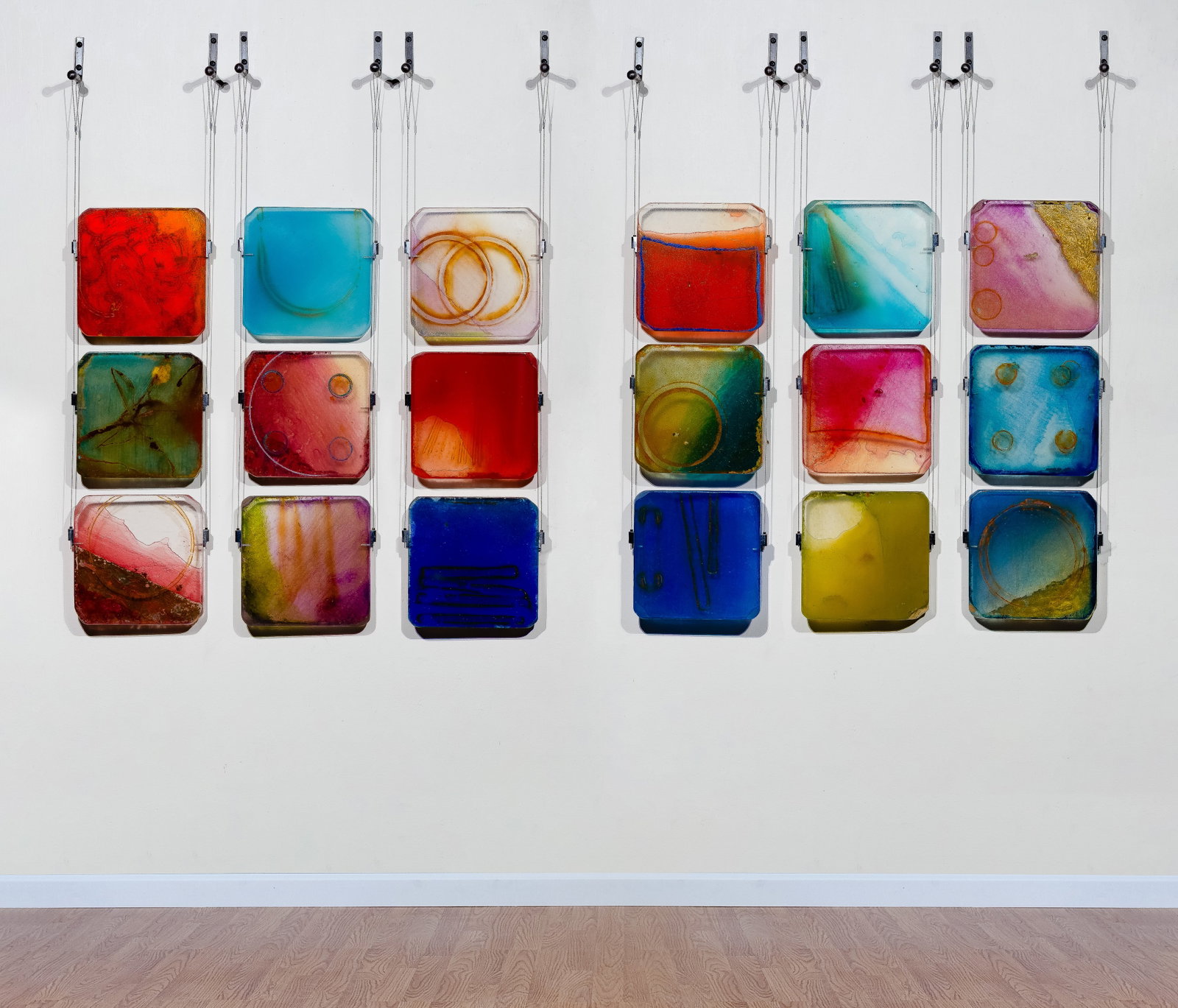 Carrie McGee (American, b.1954) Mixed Media Hanging Sculptures: Carrie McGee (American, b.1954) Mixed Media Hanging Sculptures (2) items dated 2007 and 2009, signed, each composed of nine acrylic panels suspended on wire from metal hanging apparatuses to float awa