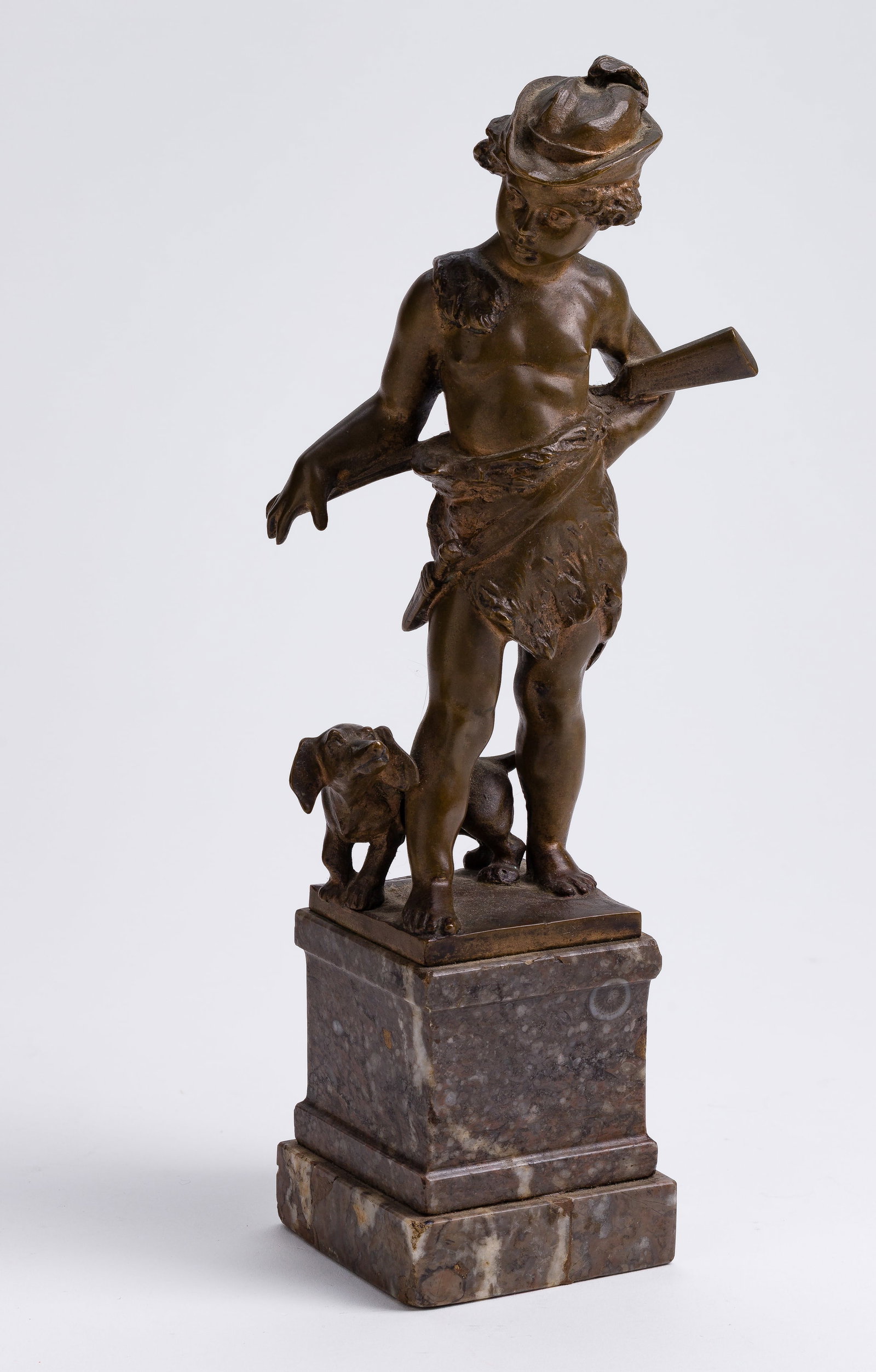 Konig (German, 20th Century) Bronze Cabinet Sculpture: Konig (German, 20th Century) Bronze Cabinet Sculpture Undated, cast stamp Konig on base, #45/106, depicting a young boy hunter and his dog on a stepped hard stone base Property from: an Estate, Chicag