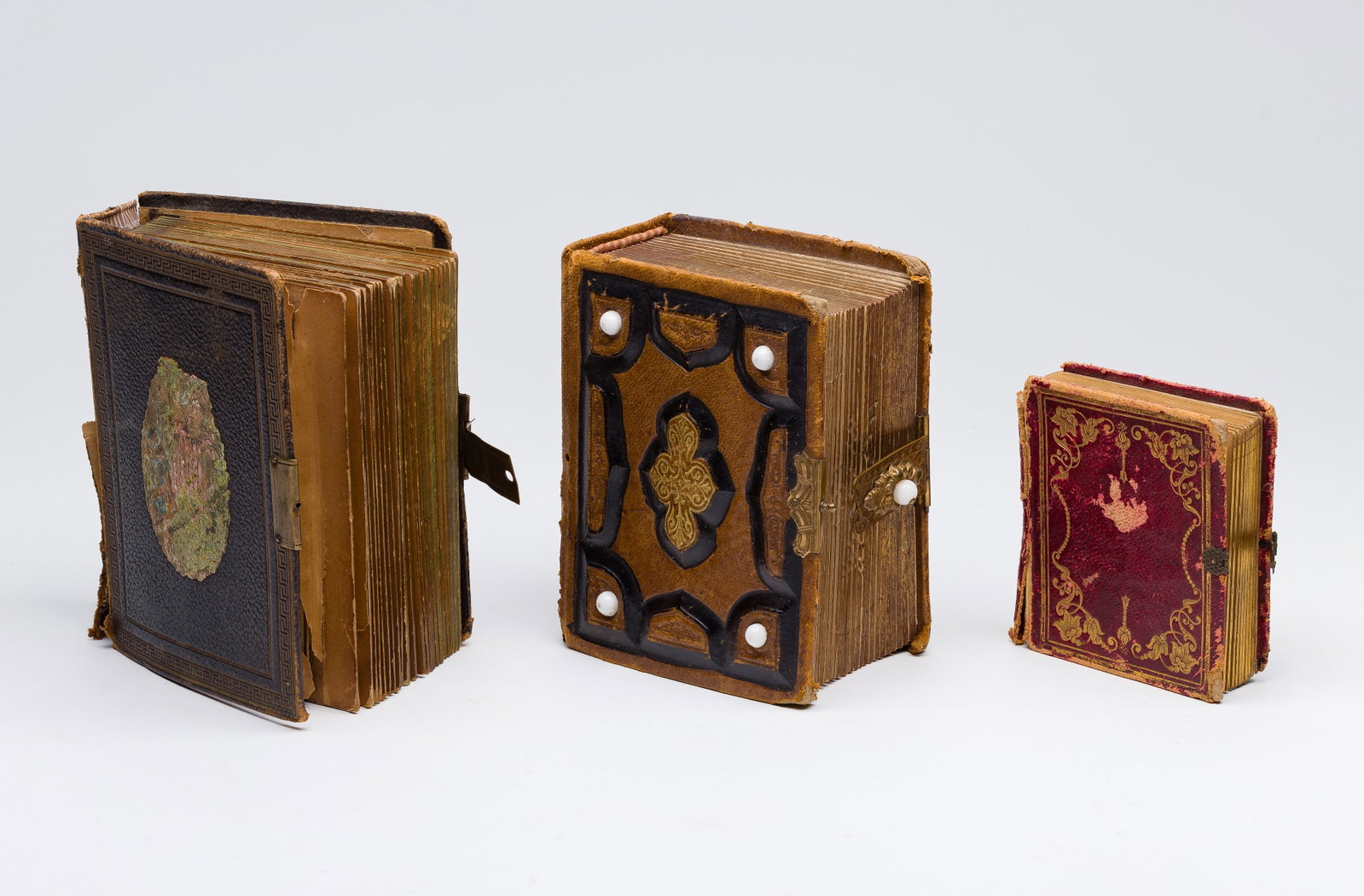 Civil War Era Tintypes and Cartes de Visite: Civil War Era Tintypes and Cartes de Visite (3) items including an album of approximately twenty-five small headshot tintypes and (2) larger albums of approximately fifty cartes de visite showing