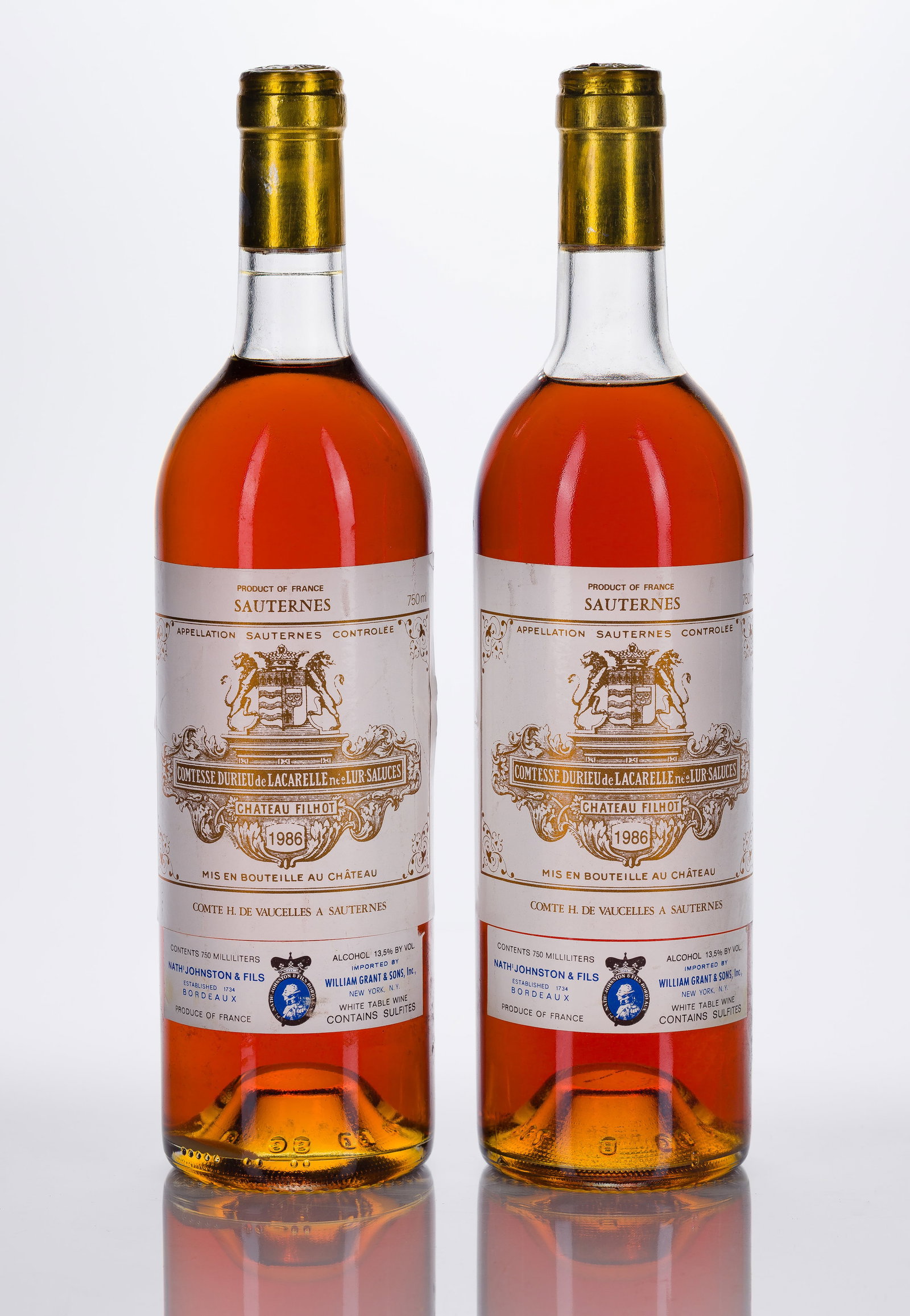 1986 Chateau Filhot Sauternes: 1986 Chateau Filhot Sauternes 1986 Chateau Filhot Sauternes (2x 750 ml) Bordeaux, France, fill: BN, labels: fully legible, intact, staining, capsules / corks: firm, original, minor signs of leakage,