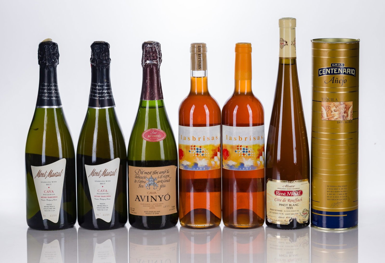 Wine Assortment: Wine Assortment (7) total items including Mont Marcal Cava Brut Reserva (2x 750 ml), bottle of Avinyo Cava Brut Reserva (1x 750 ml), Las Brisas wine (2x 750 ml), a 1999 René Mure Pinot Blanc (1x 750