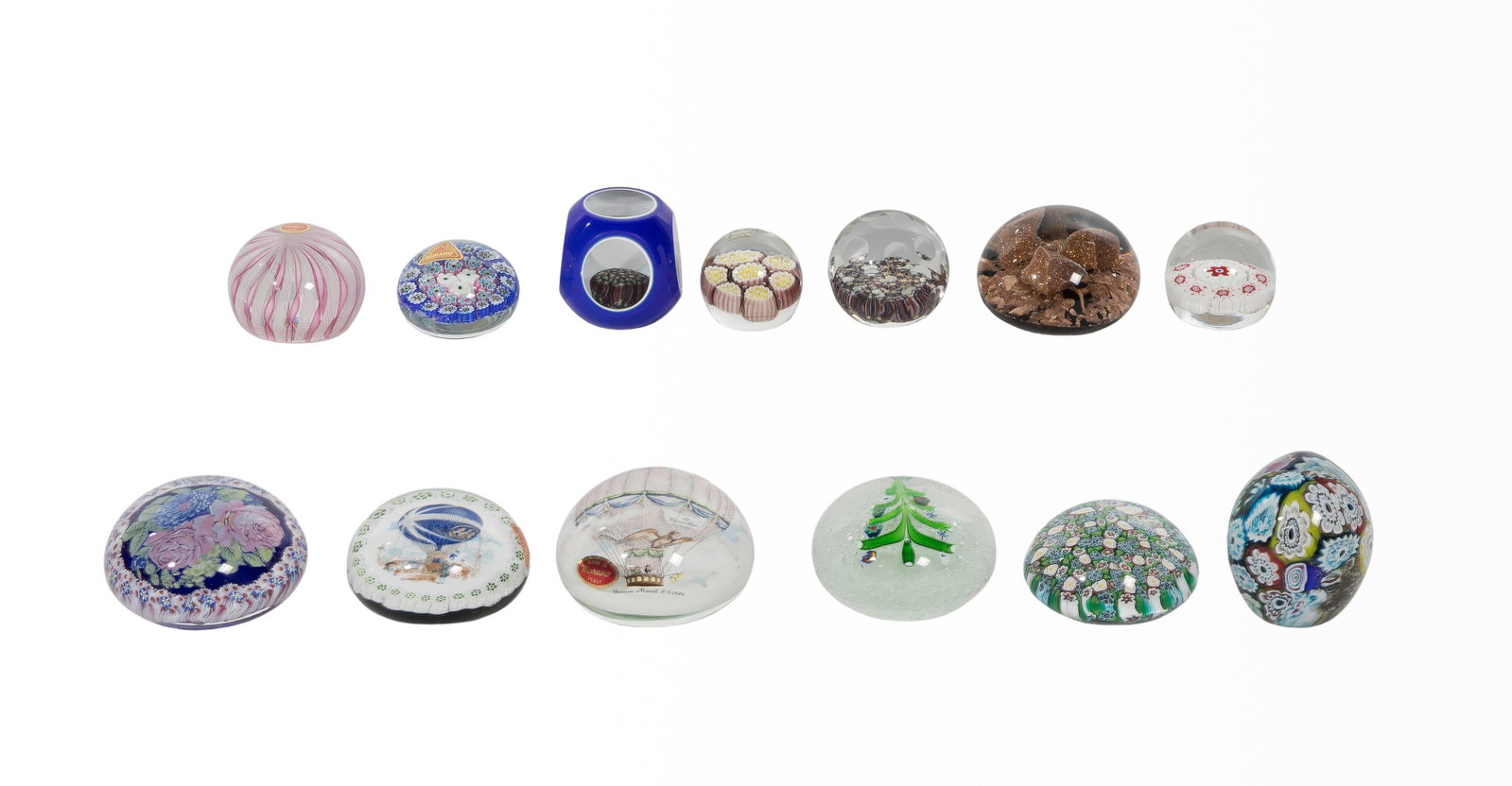 Murano Paperweight Assortment: Murano Paperweight Assortment (13) items of various shapes, sizes and designs, most retaining original labels Property from: a Private Collector, Lombard, Illinois Height: 2 inches, Diameter: 3 3/4