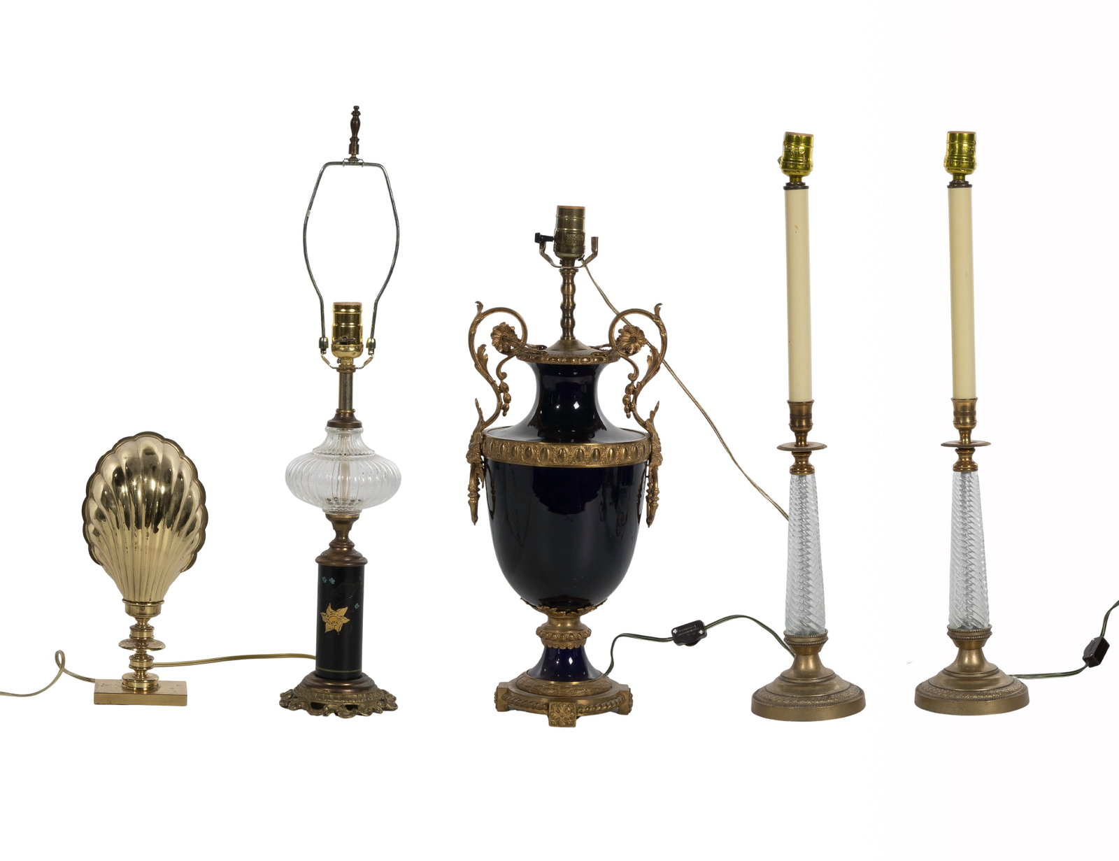 Lamp Assortment: Lamp Assortment (5) items including a brass clam accent, a glass and black floral porcelain base, a pair of glass buffet lamps and a cobalt porcelain having ormolu mounts, no shades Property from: a