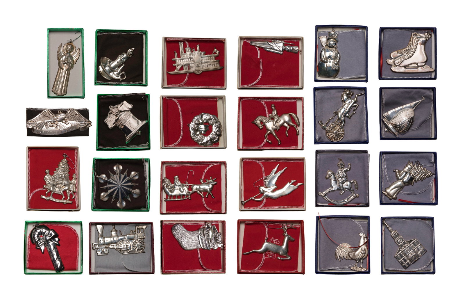 Gorham Sterling Silver Holiday Ornament Assortment: Gorham Sterling Silver Holiday Ornament Assortment (28) items from years 1973 through 1998 (1983 and 1987 having two of each) depicting Christmas and seasonal themes, all but one having boxes, one