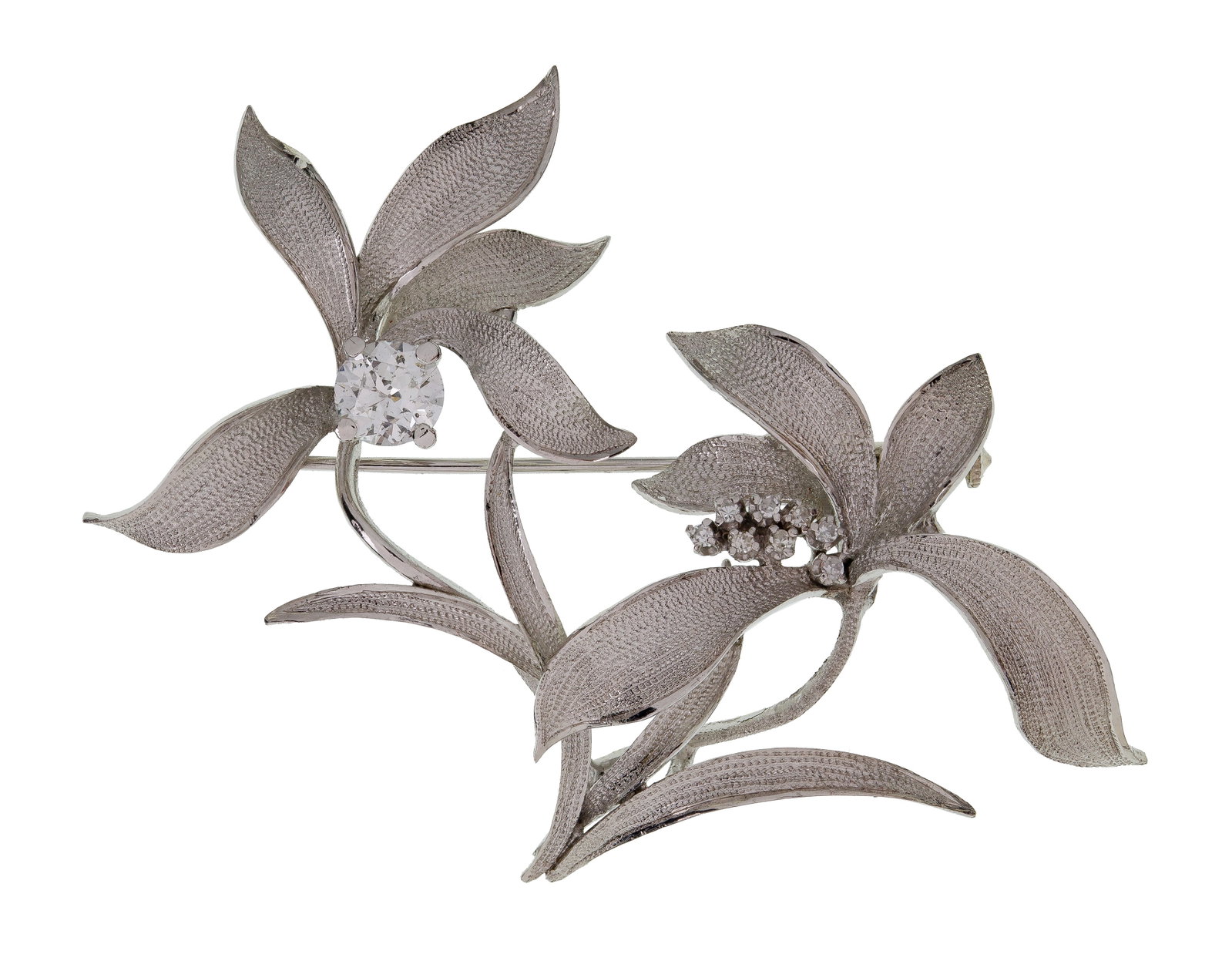 14k White Gold and Diamond Floral Brooch: 14k White Gold and Diamond Floral Brooch A double flowered brooch, one flower having center round cut diamond weighing approximately 0.87 carat, G/H color, I clarity, and the other having round cut