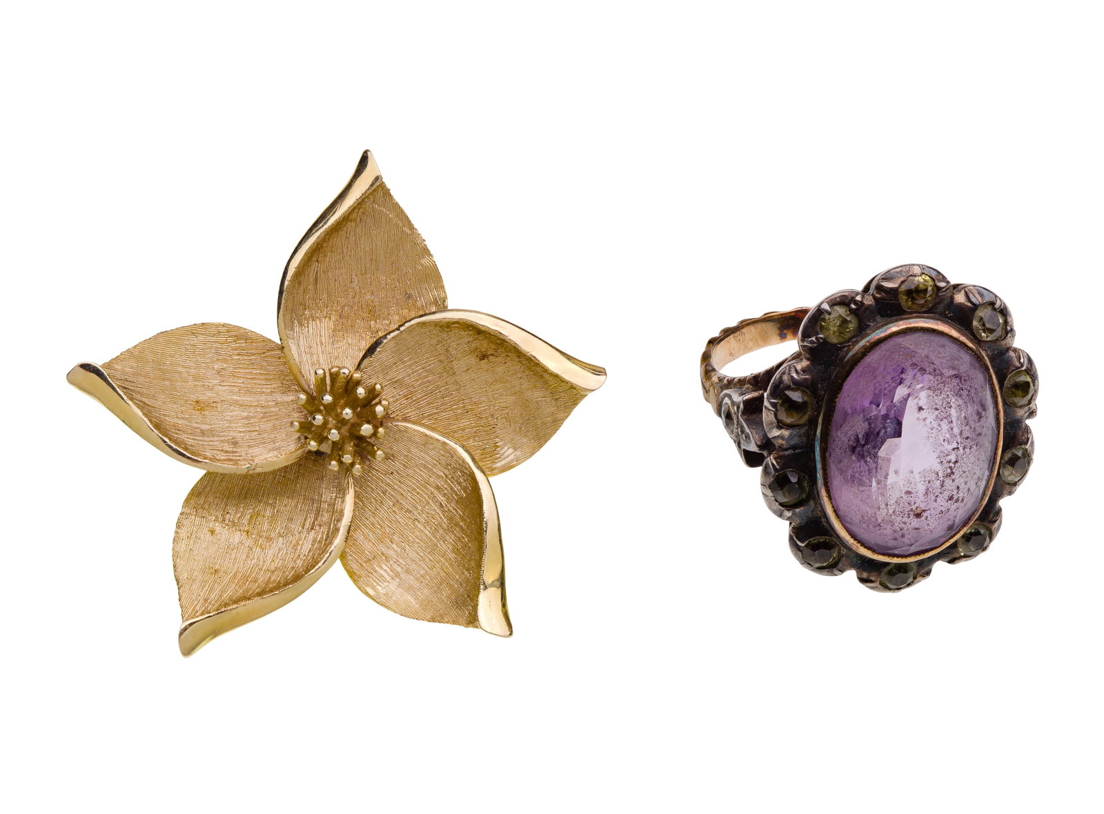 14k Yellow Gold Jewelry: 14k Yellow Gold Jewelry (2) items including an oval cut amethyst and green topaz cocktail ring and a pin in a floral motif (unmarked 14k) Property from: an Estate, Wilmette, Illinois Size: 8 (ring) We